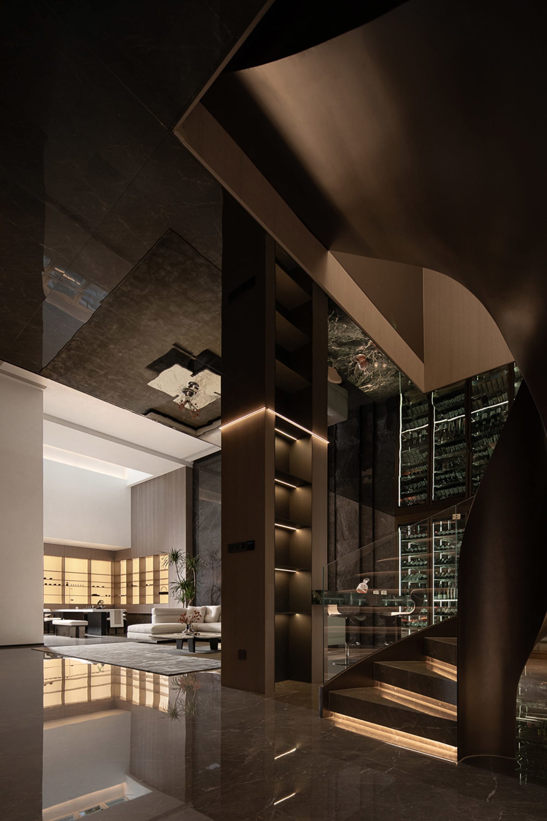 A modern interior design featuring metallic elements and a sophisticated, dark color palette.