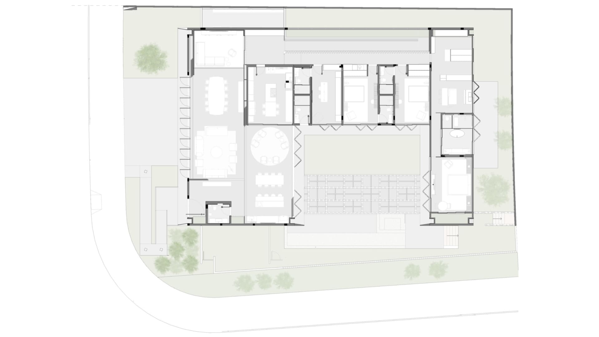 A floor plan of a modern office space with white flooring and minimalist design