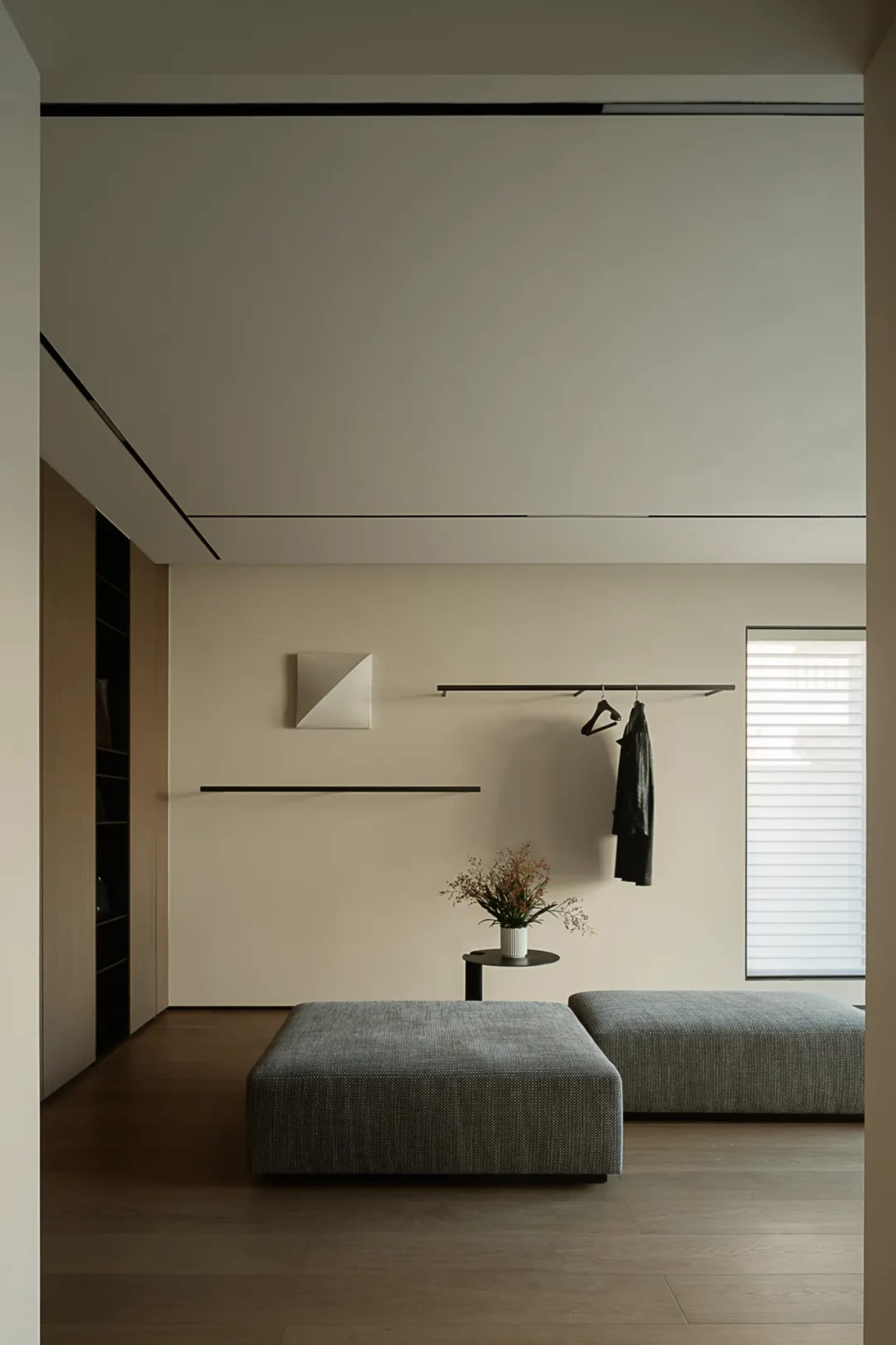 Minimalist living room with modern furniture and sleek lines.
