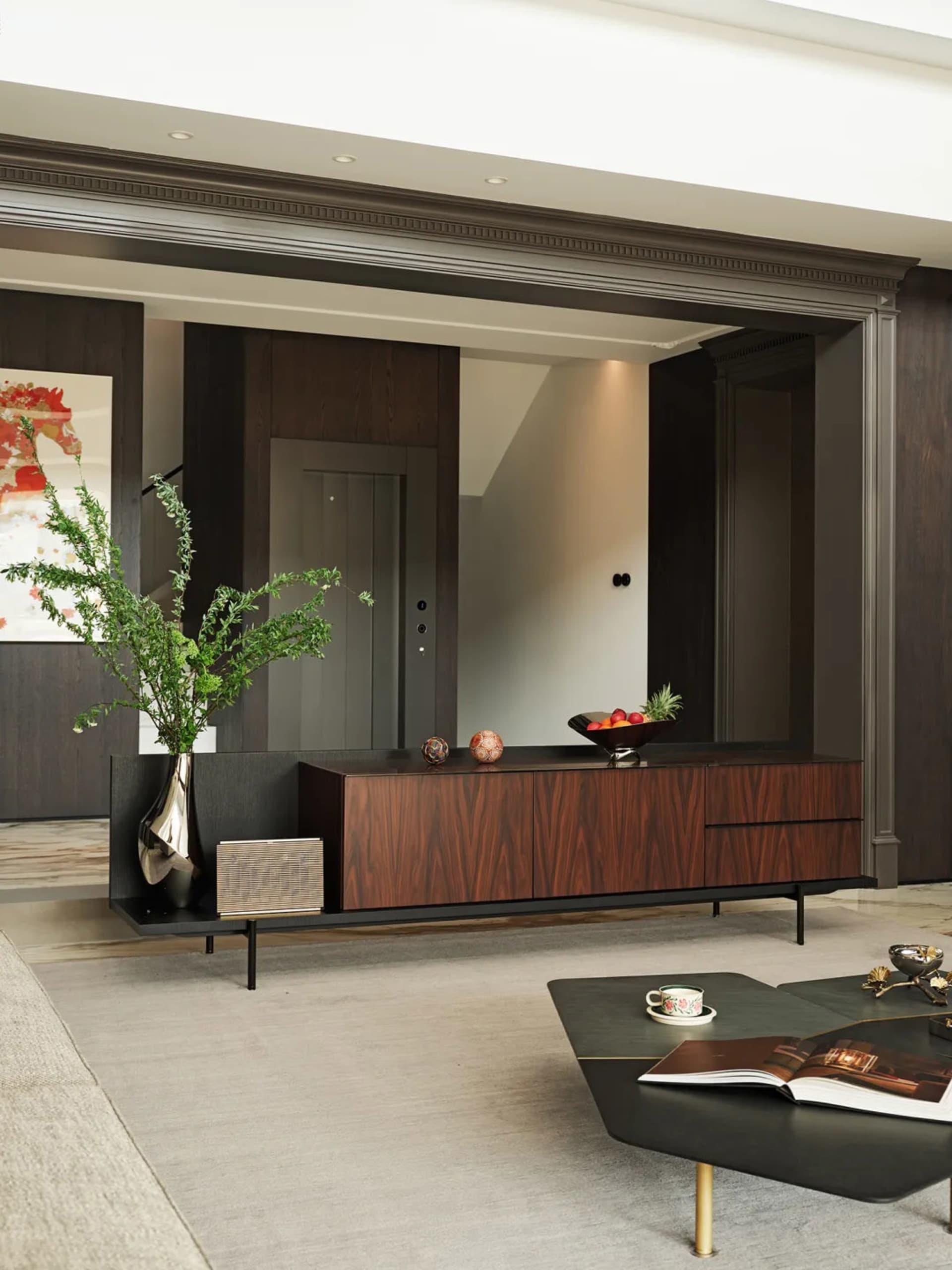 Modern living room featuring wooden and metal furniture with minimalist design