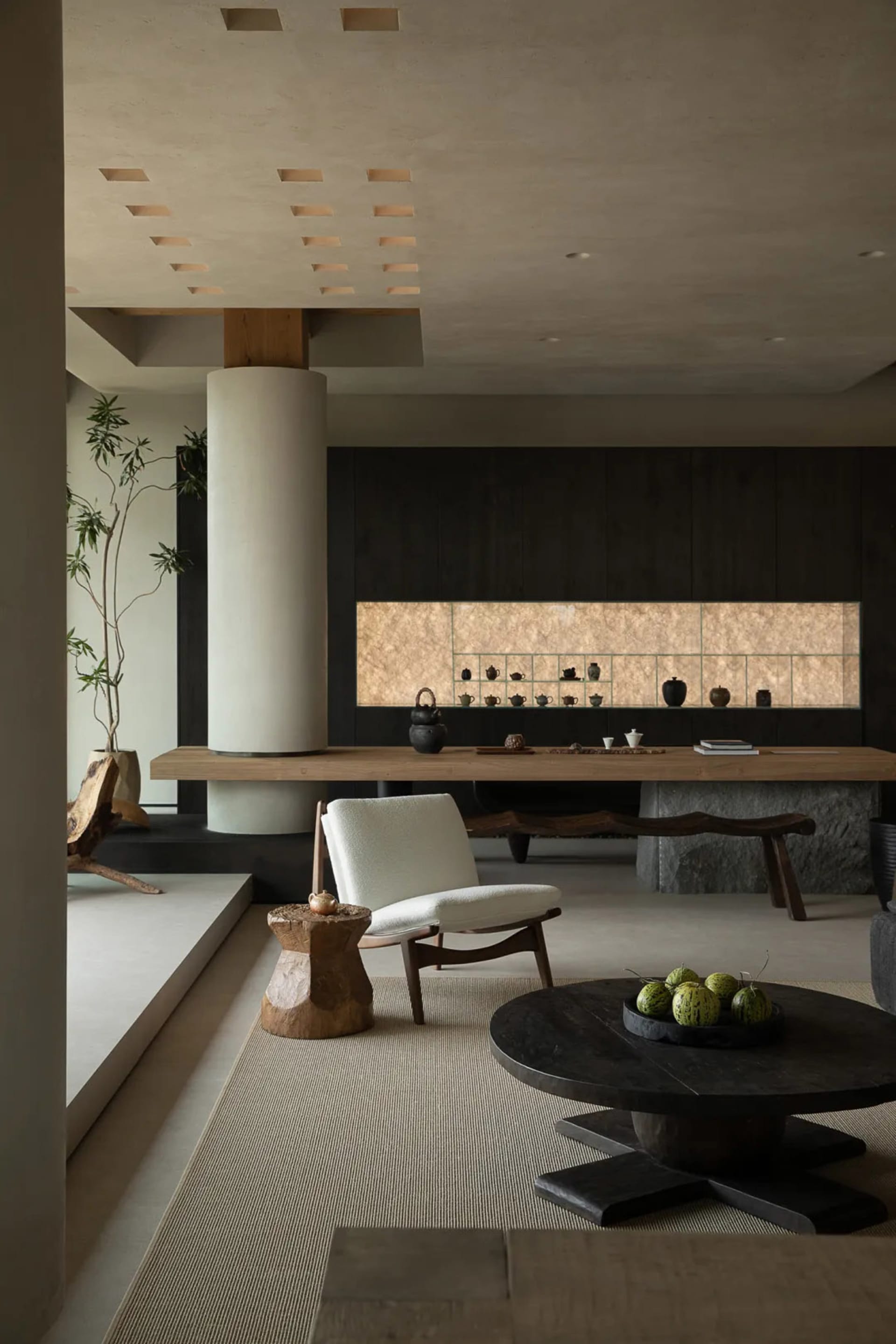 A modern living room featuring minimalist design with wooden furniture and concrete accents.