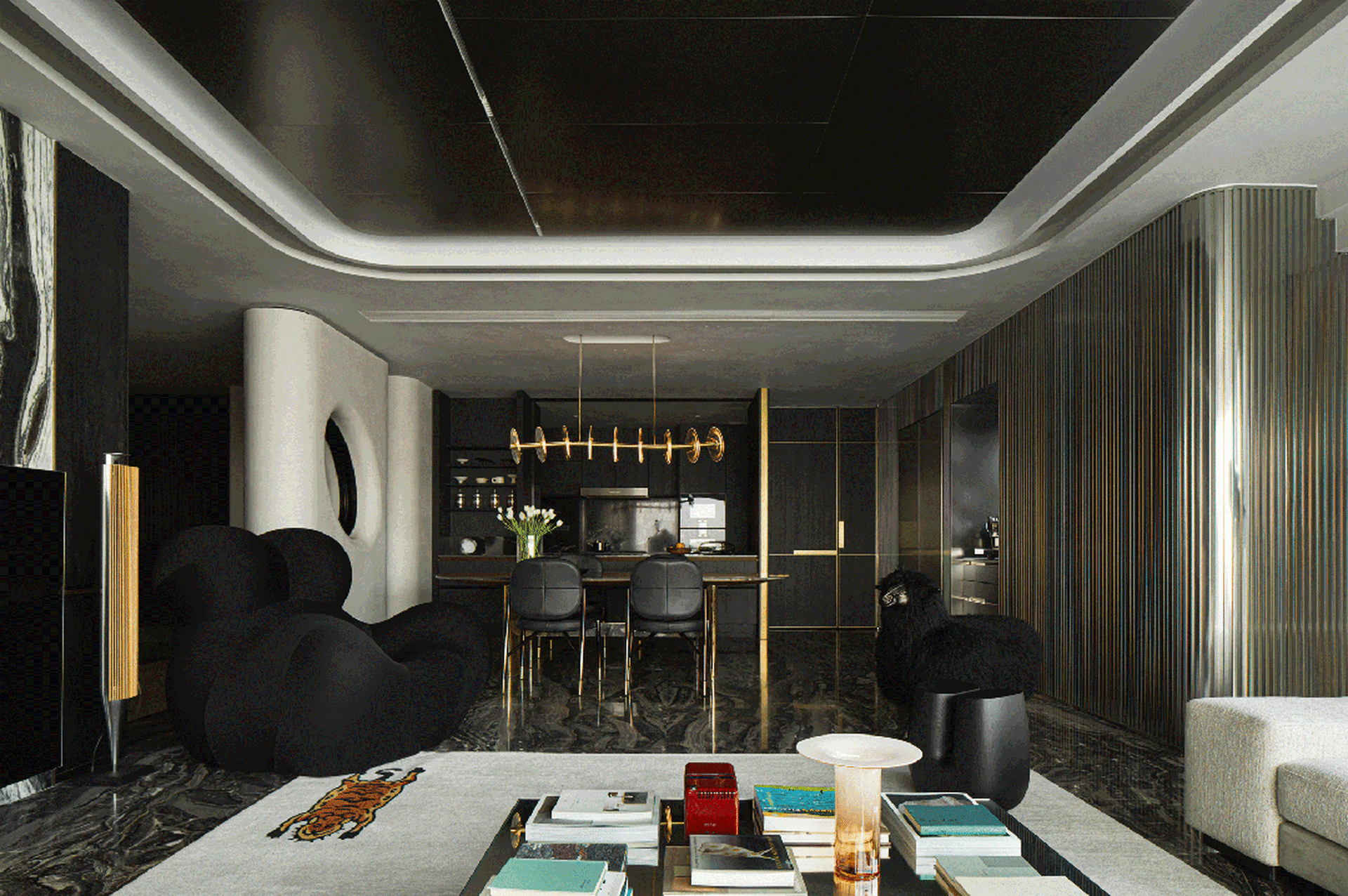 Modern living room featuring black and white interior design with metal and glass elements.