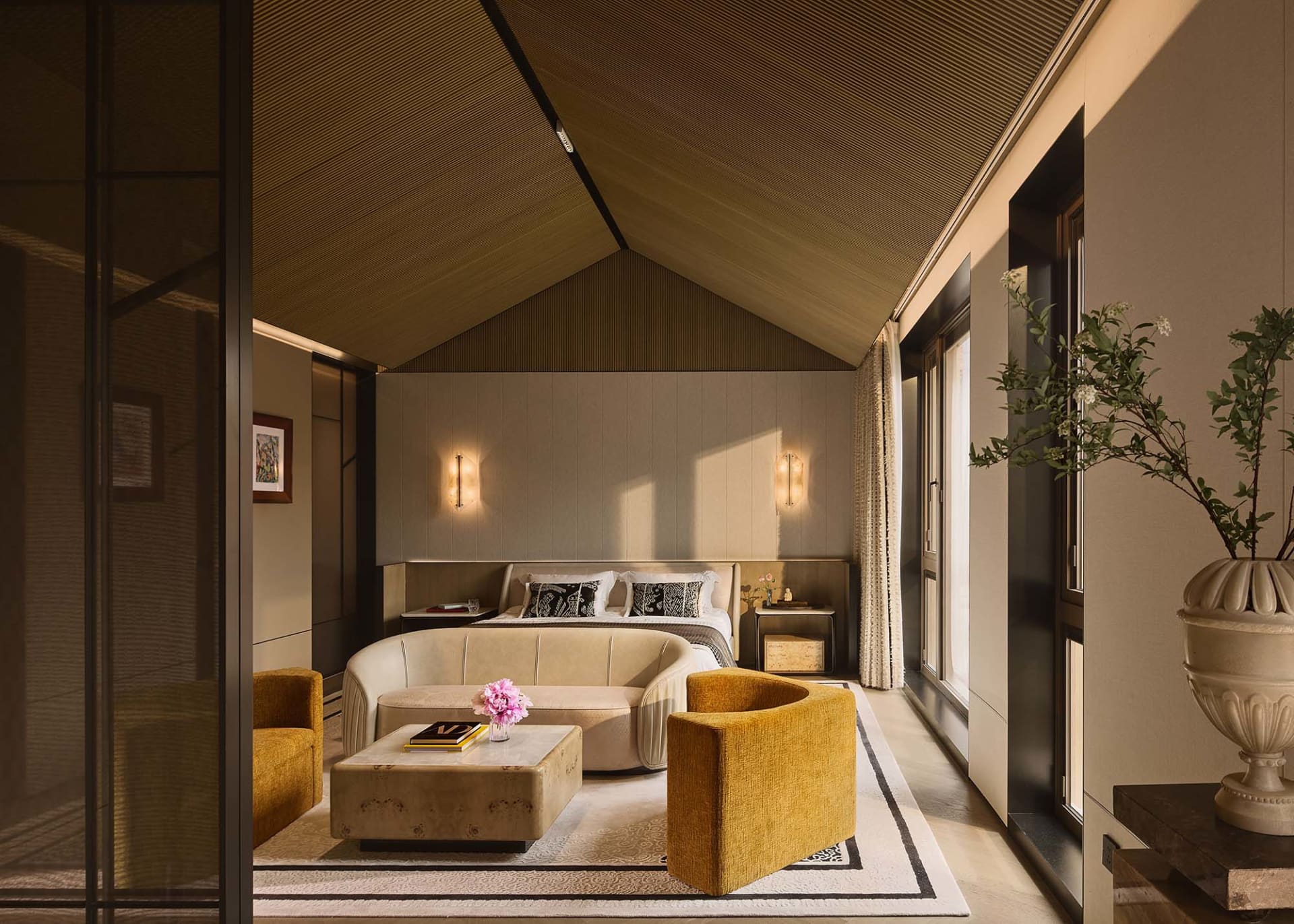 Modern minimalist bedroom with wooden walls and glass walls, featuring a white bed with black and white pillows, yellow armch