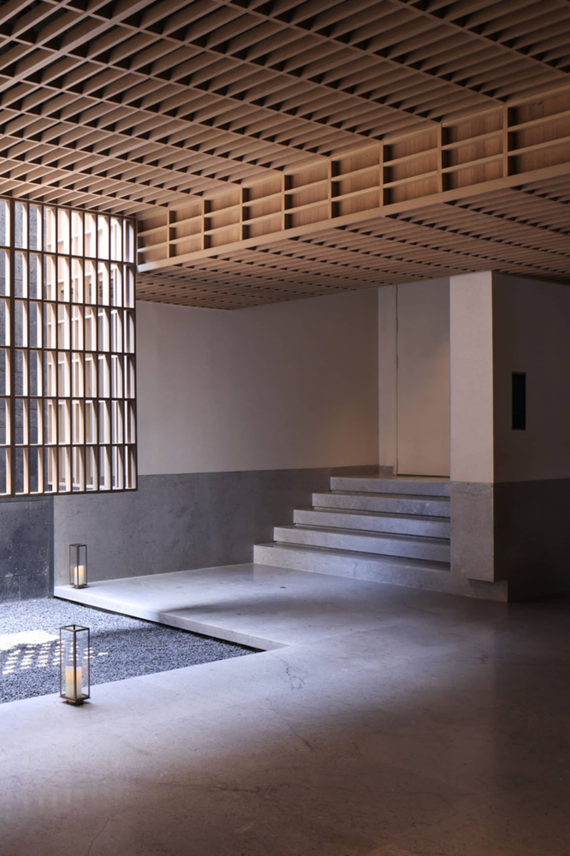 Concrete stairwell with modern lighting fixtures