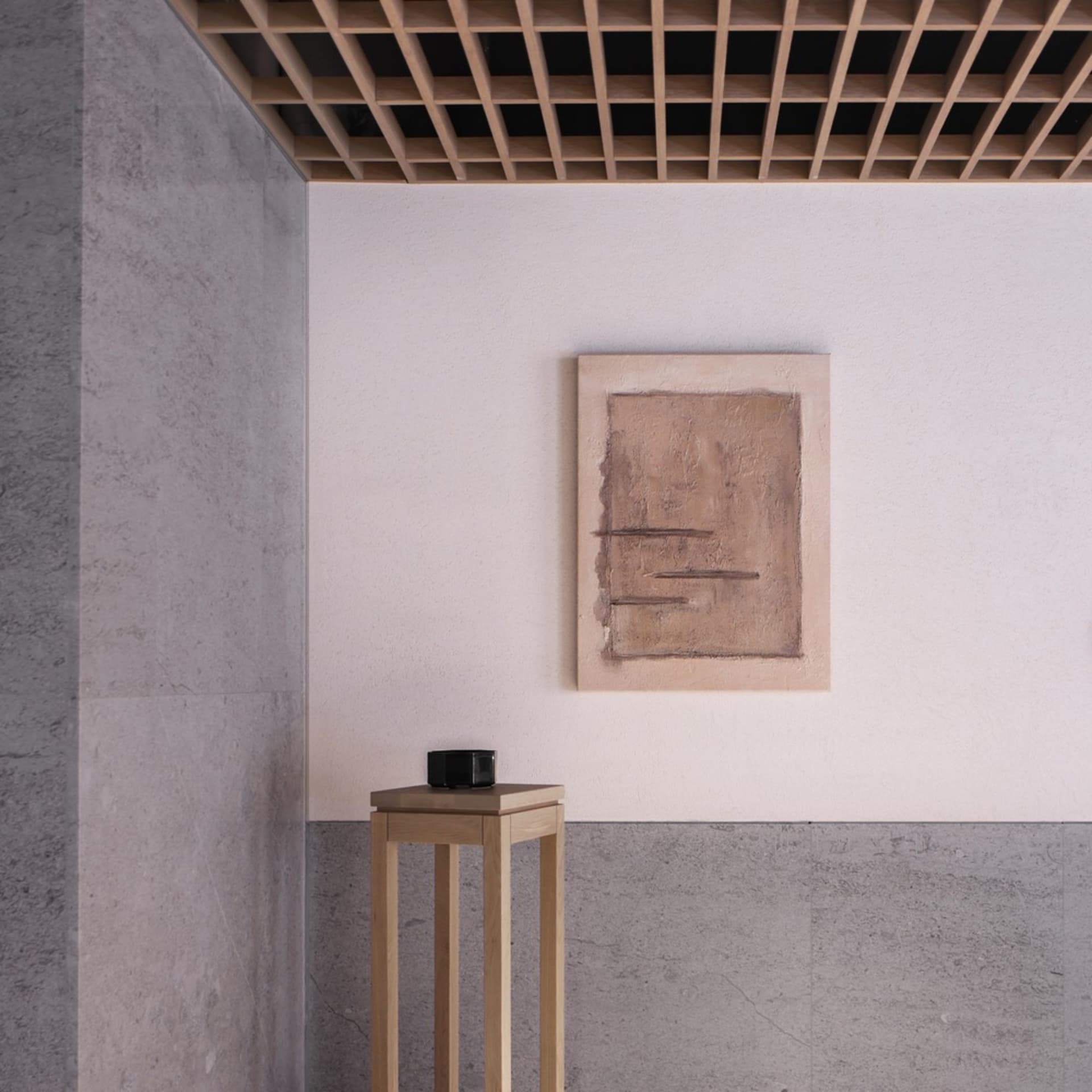 A minimalist interior featuring concrete flooring.