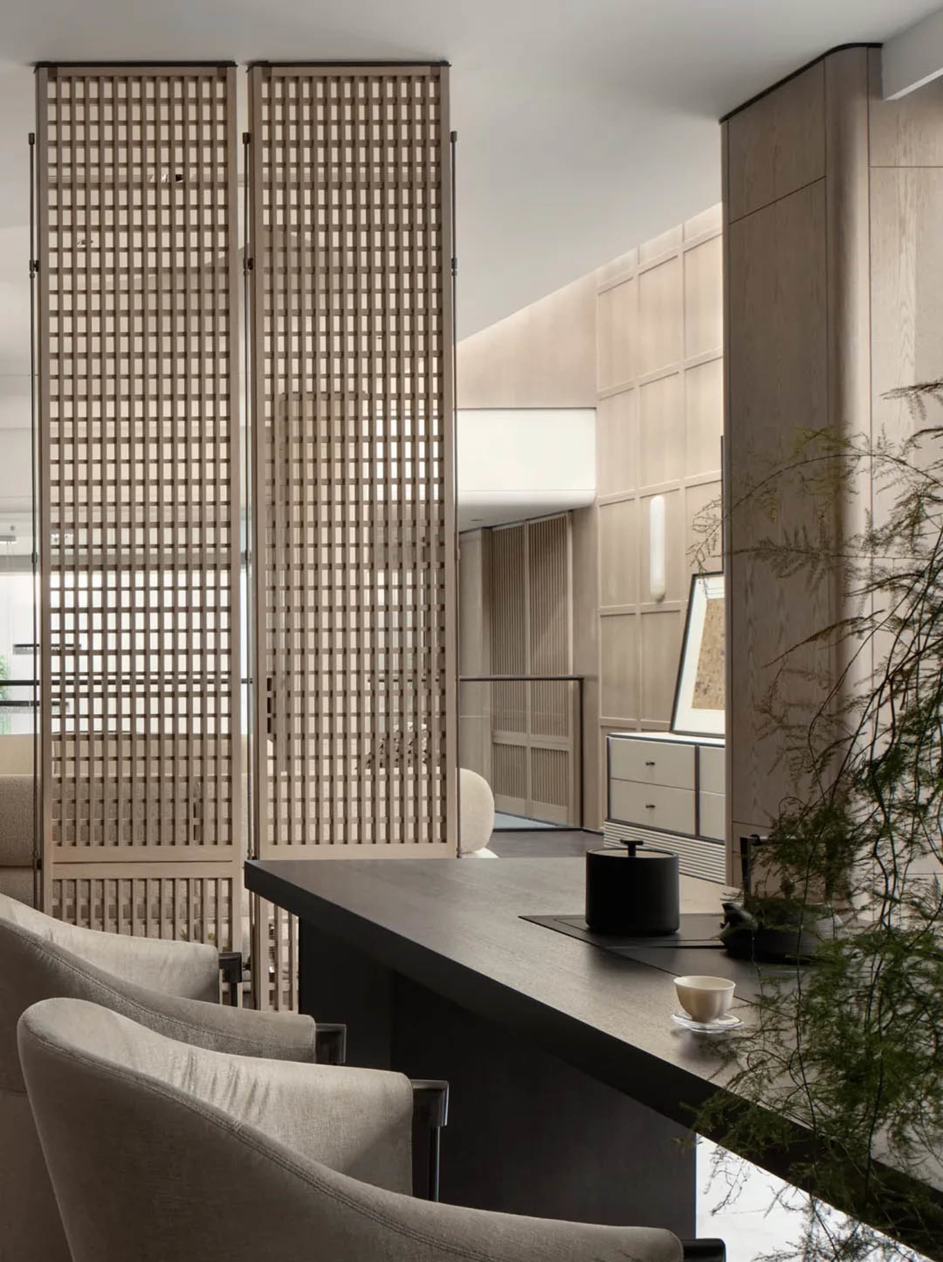 A modern interior design featuring wood-paneled walls in a living room setting.