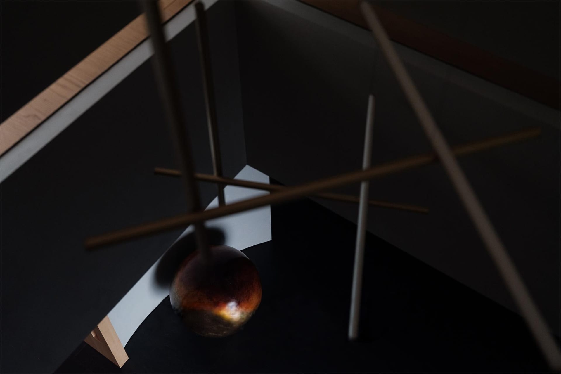 A minimalist interior design featuring a wooden element.
