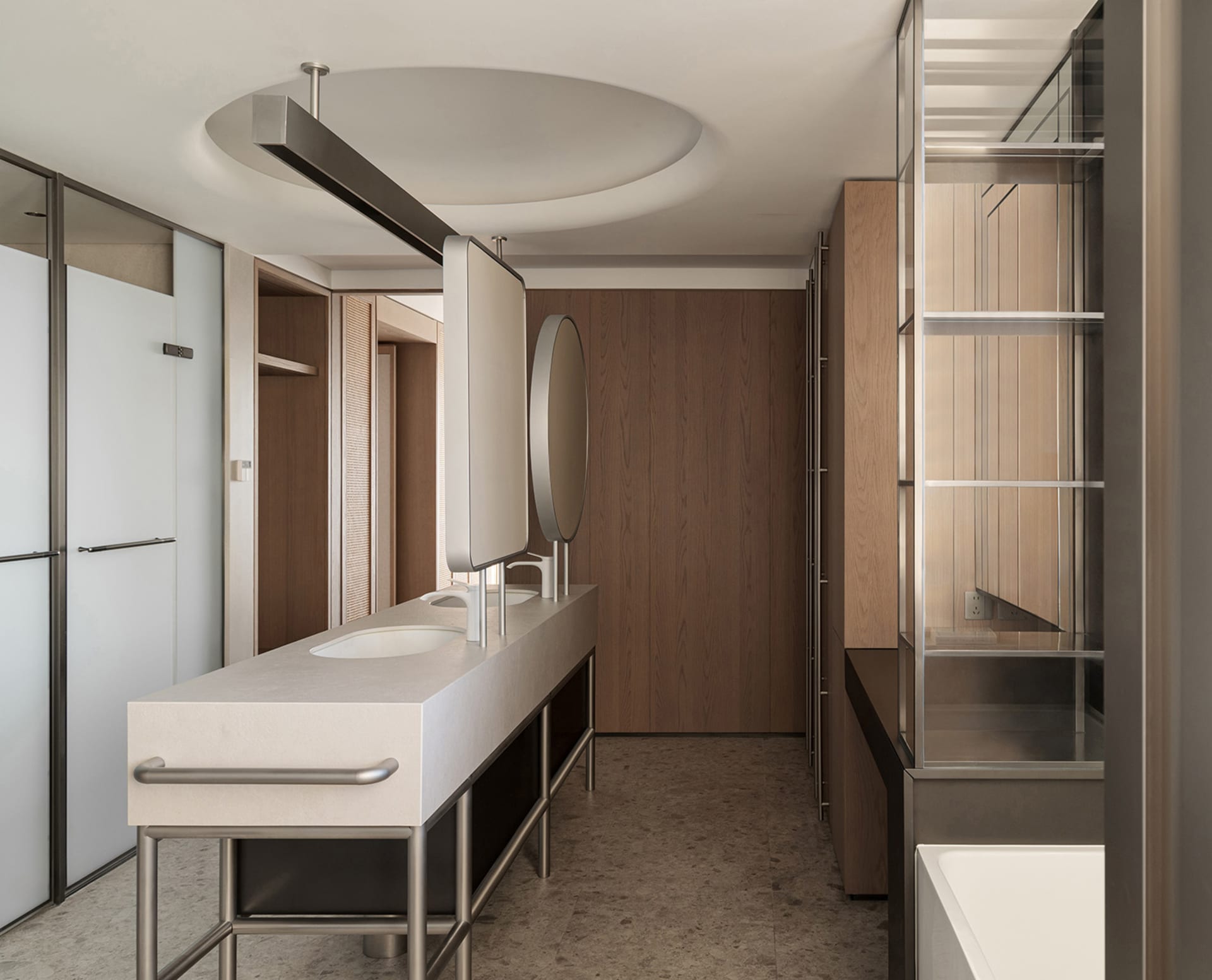 Modern bathroom featuring concrete walls and a minimalist design.