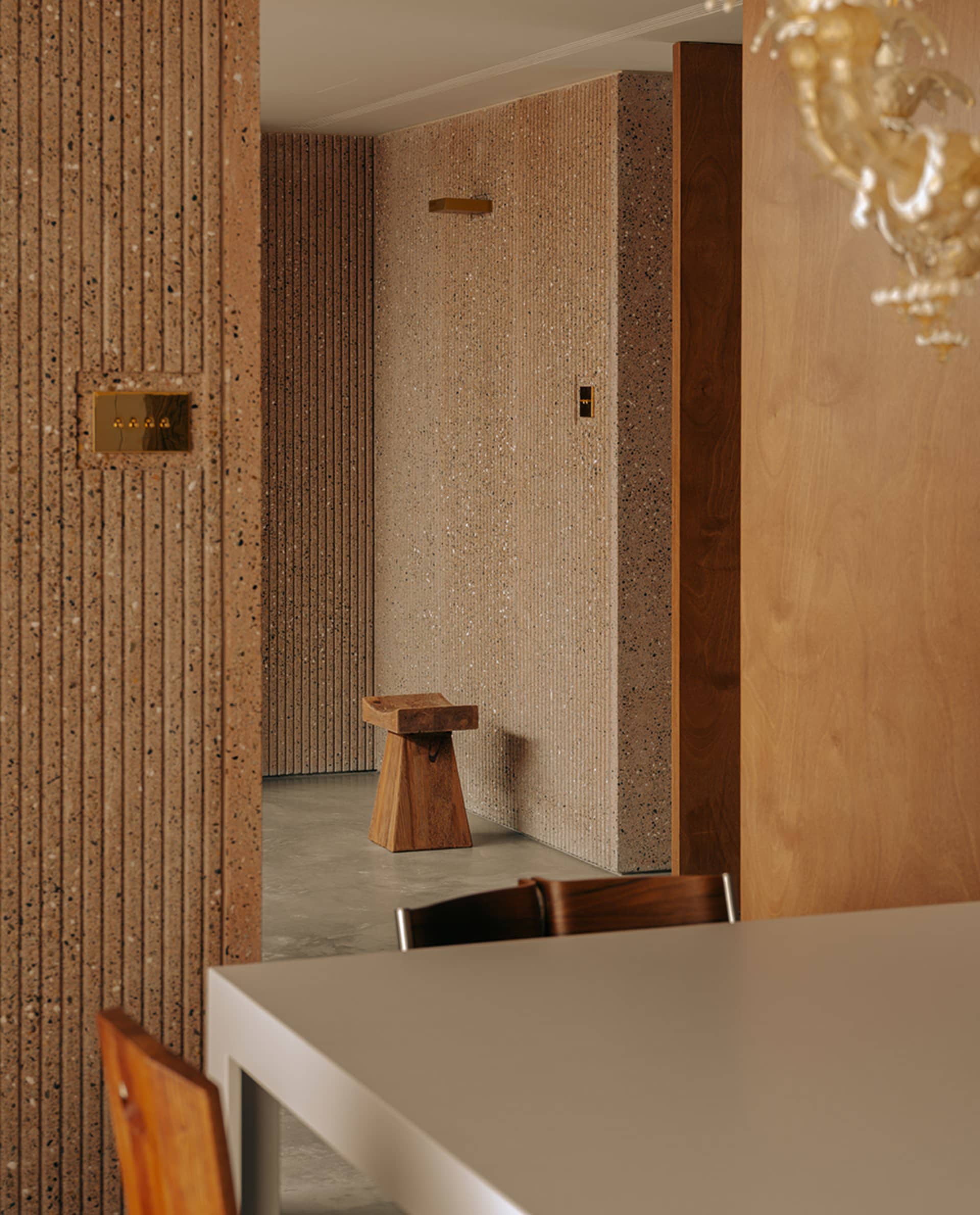 Industrial commercial space featuring concrete and wooden elements.
