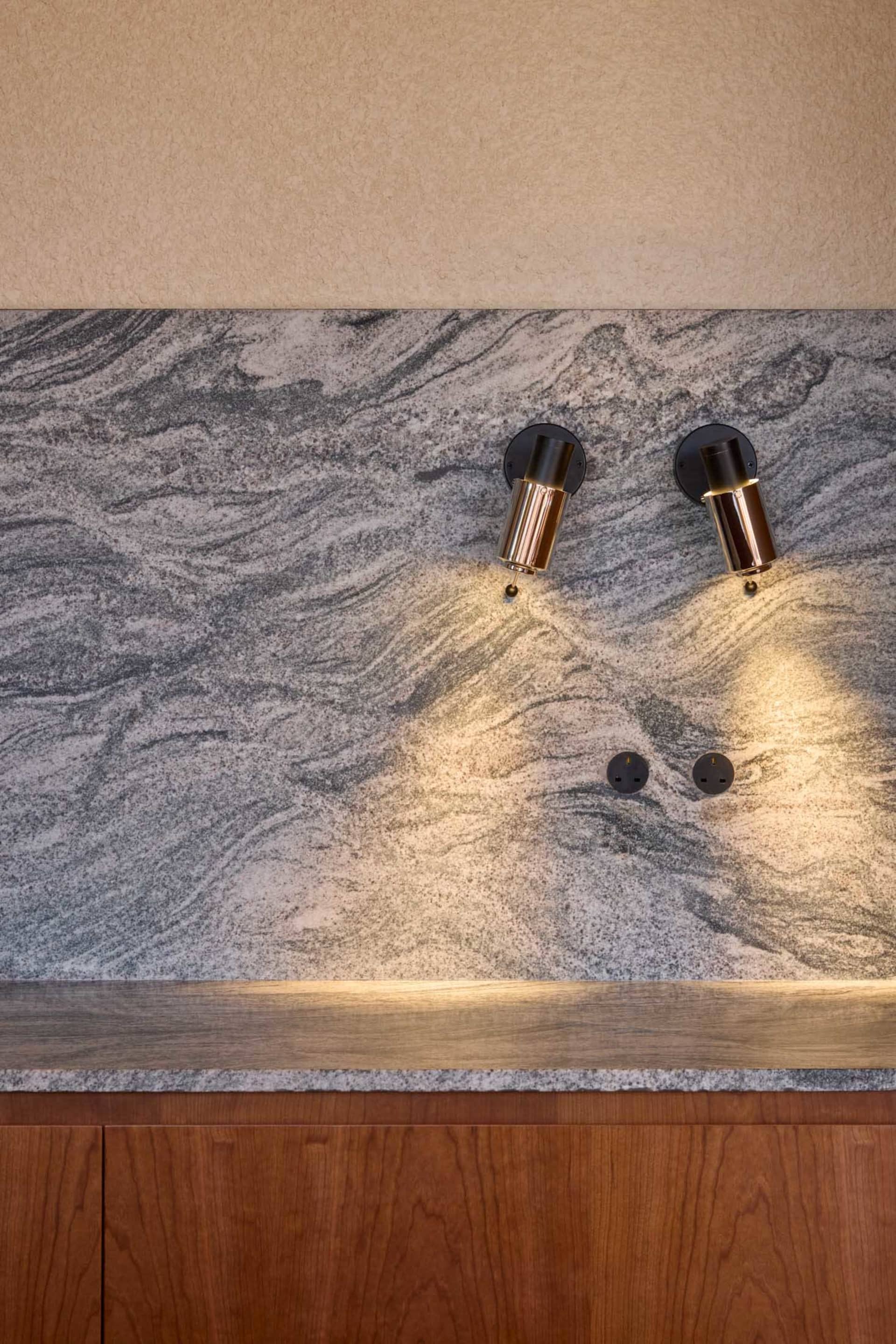 A modern interior space featuring a granite countertop.
