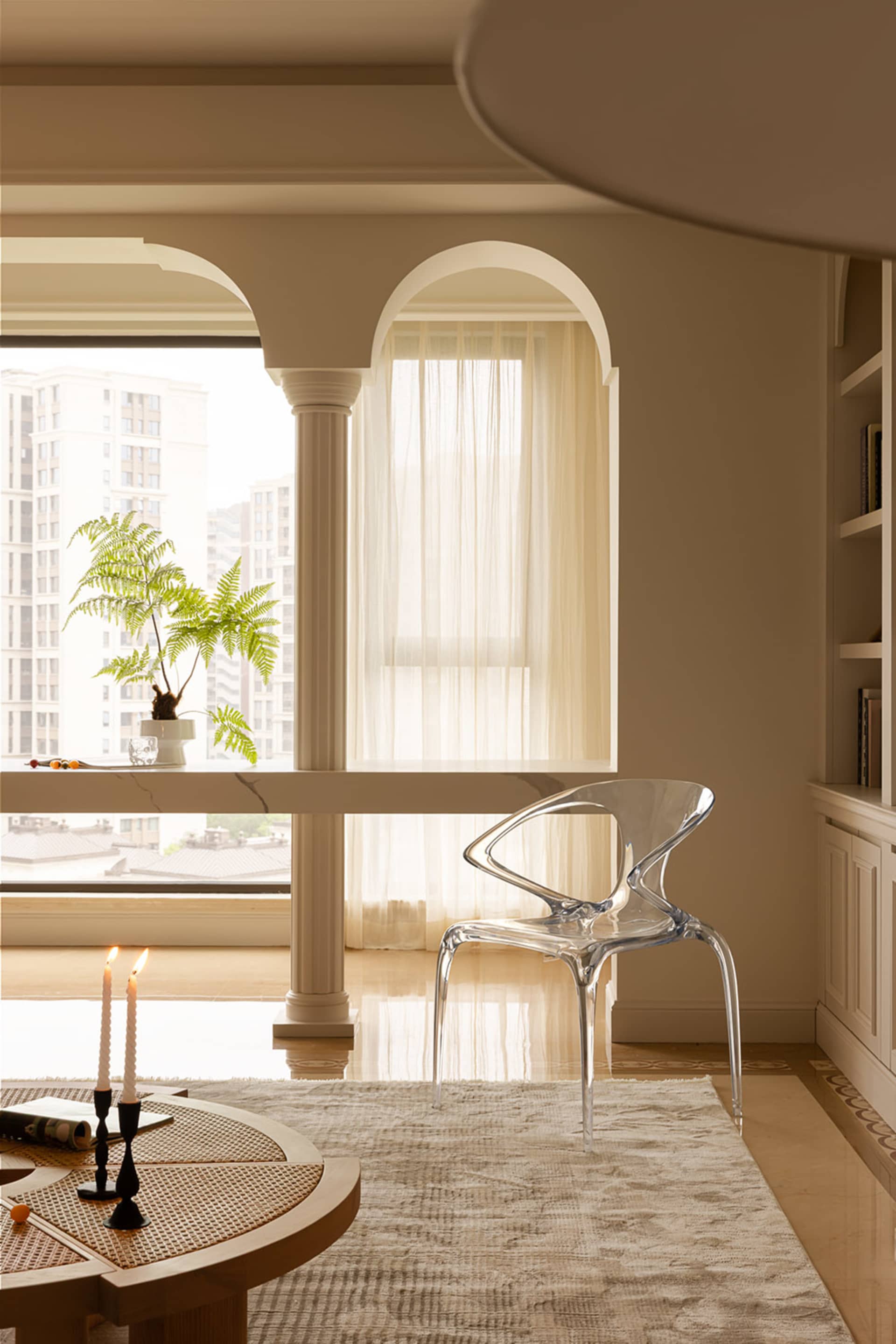 Modern residential interior design featuring glass, marble, and wooden elements.