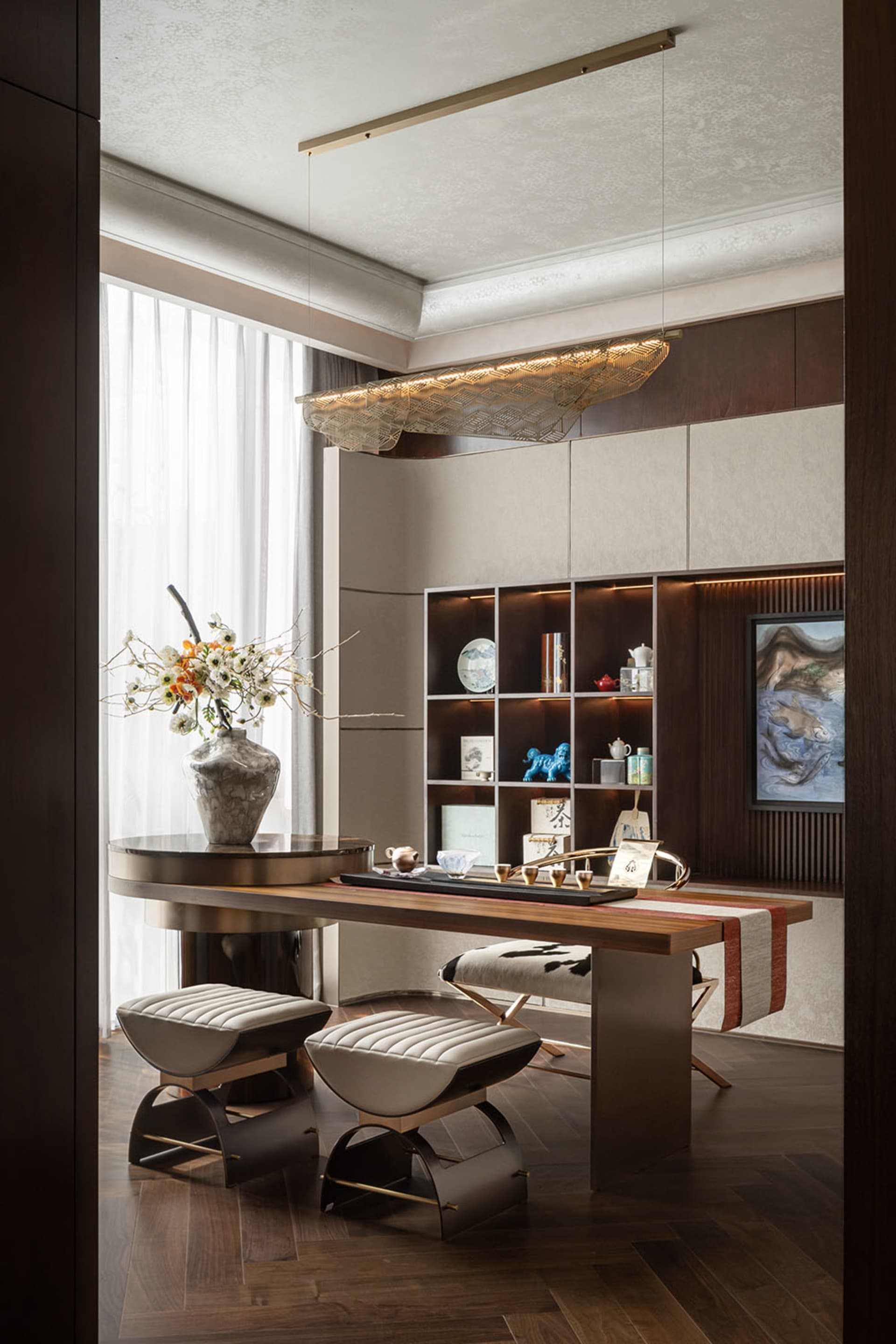 A modern living room with wood paneled walls and ceiling, featuring contemporary furniture and a minimalistic design aestheti