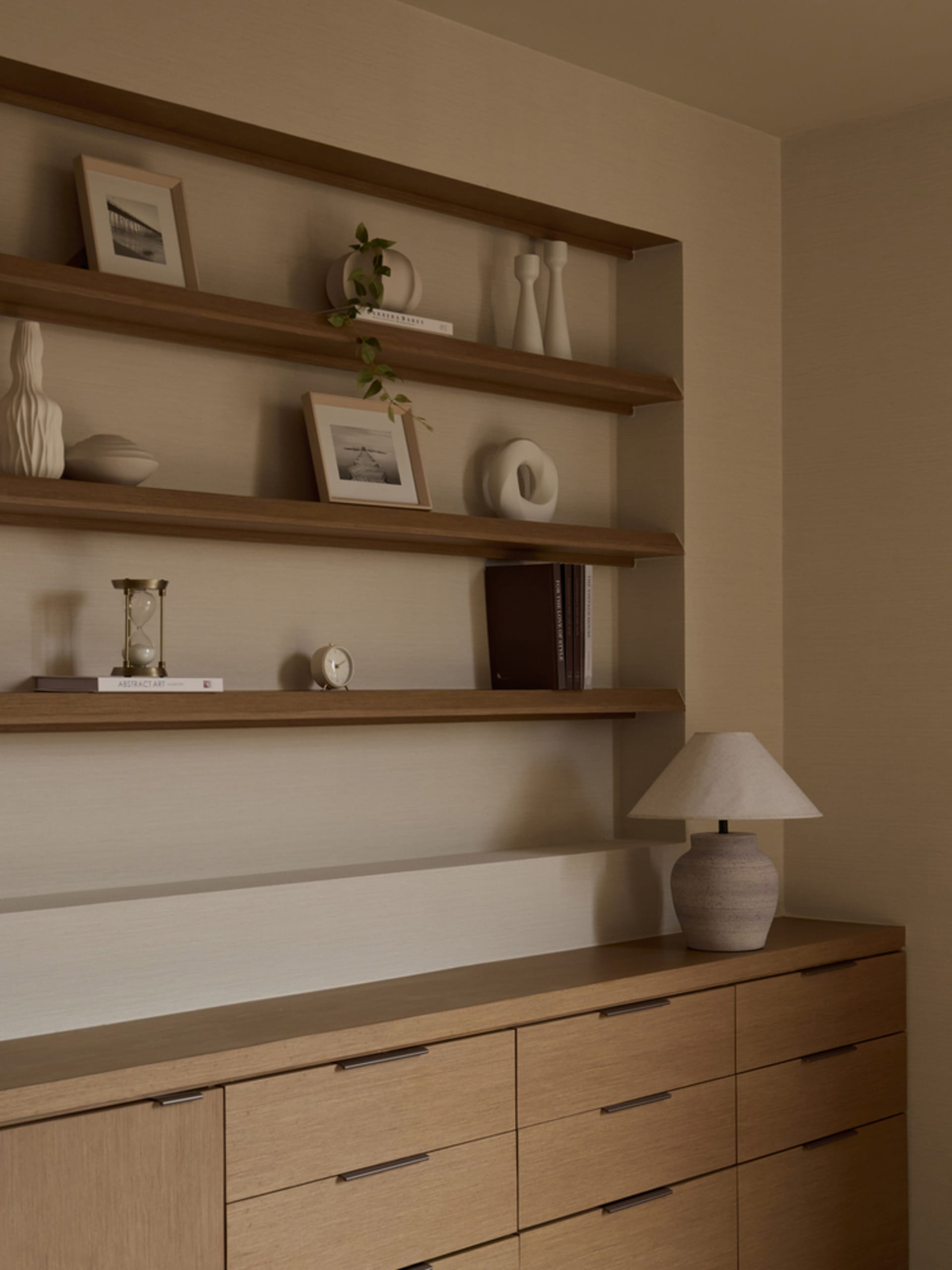 A modern minimalist office space featuring wooden furniture.
