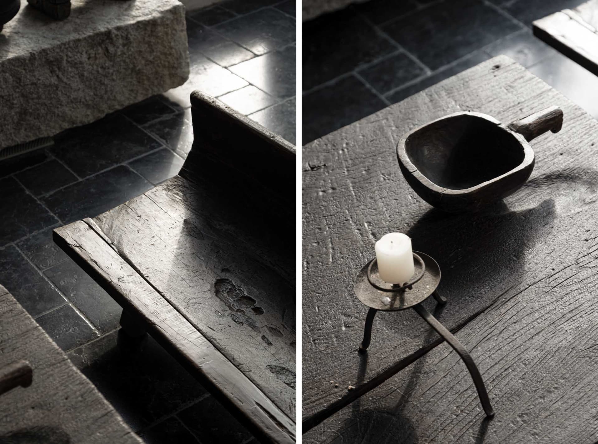 An antique wooden furniture piece with a candle and a wooden bowl on a vintage table.