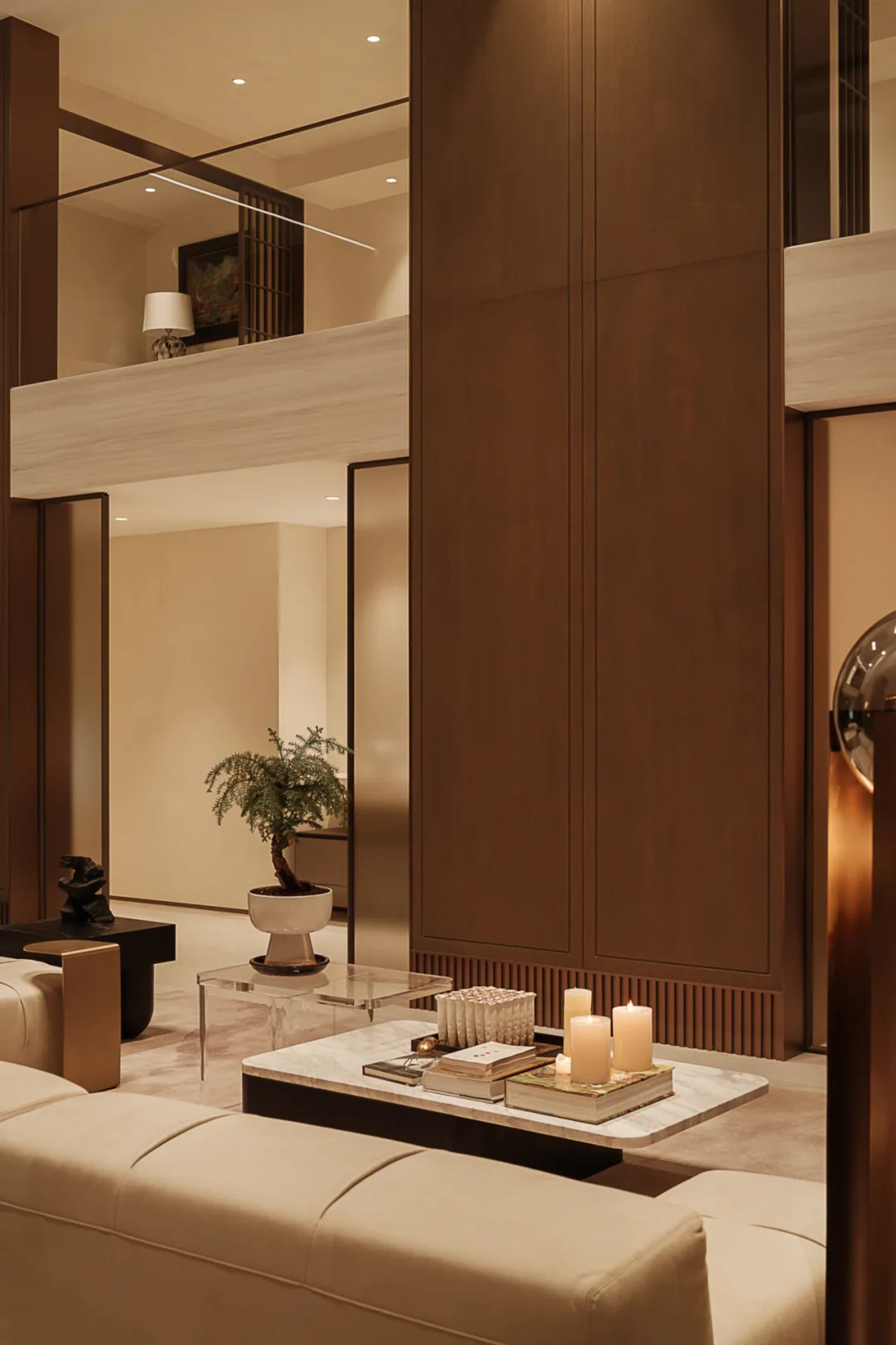 Neutral-toned leather furniture and a white marble coffee table in a modern living room