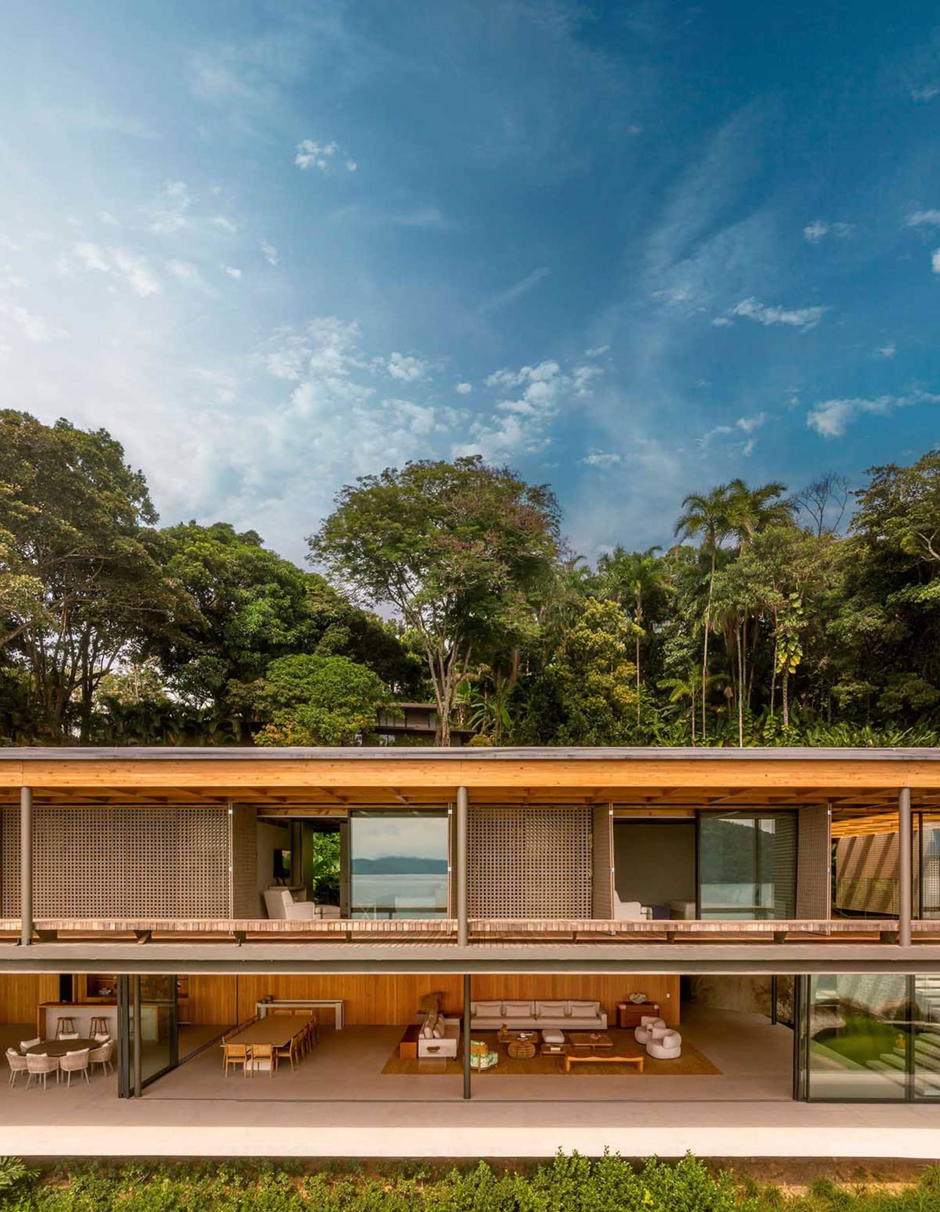 Modern residential interior featuring wooden finishes and open floor plan.