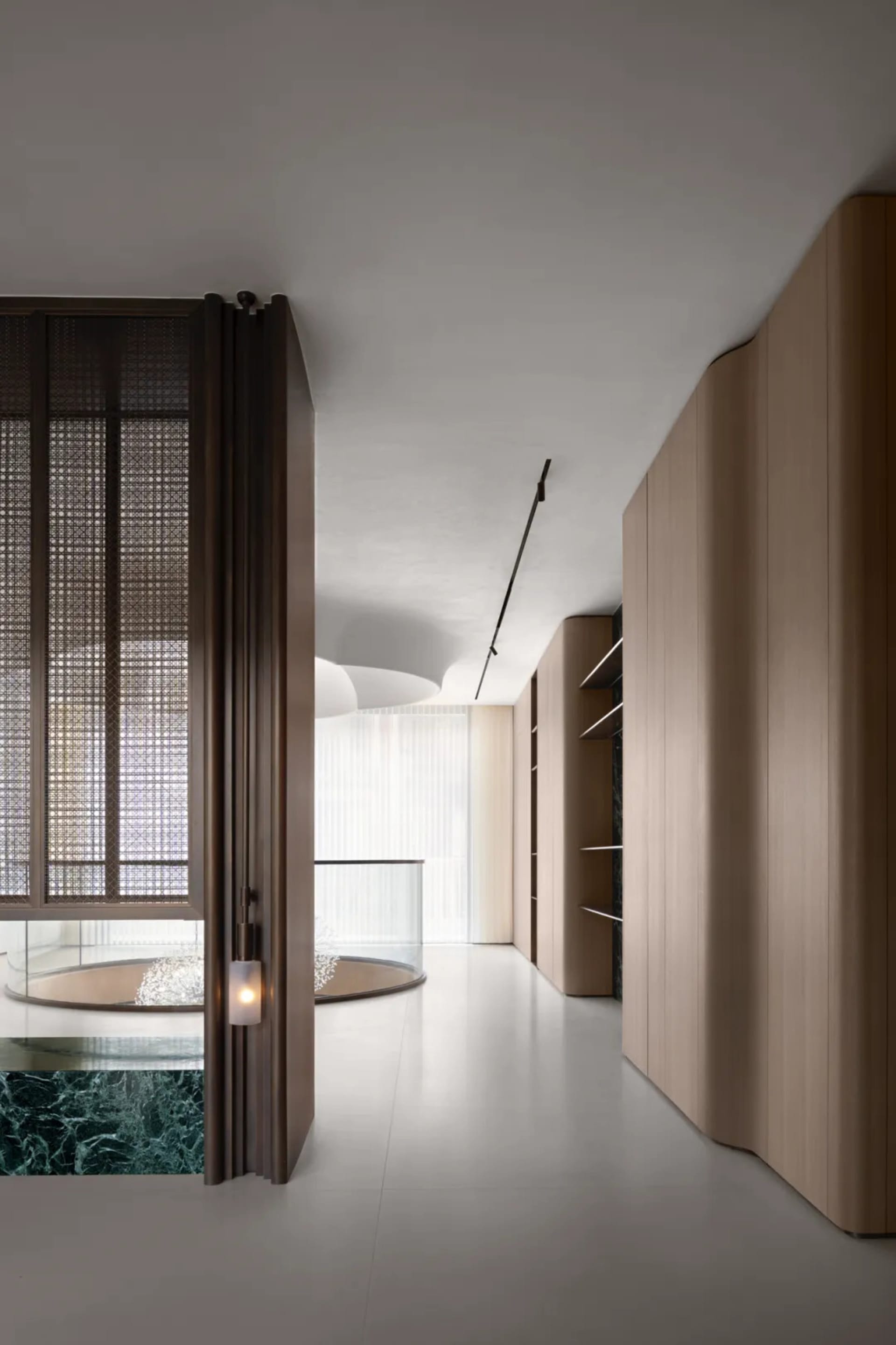 Modern interior space with wooden cabinets and minimalist design.