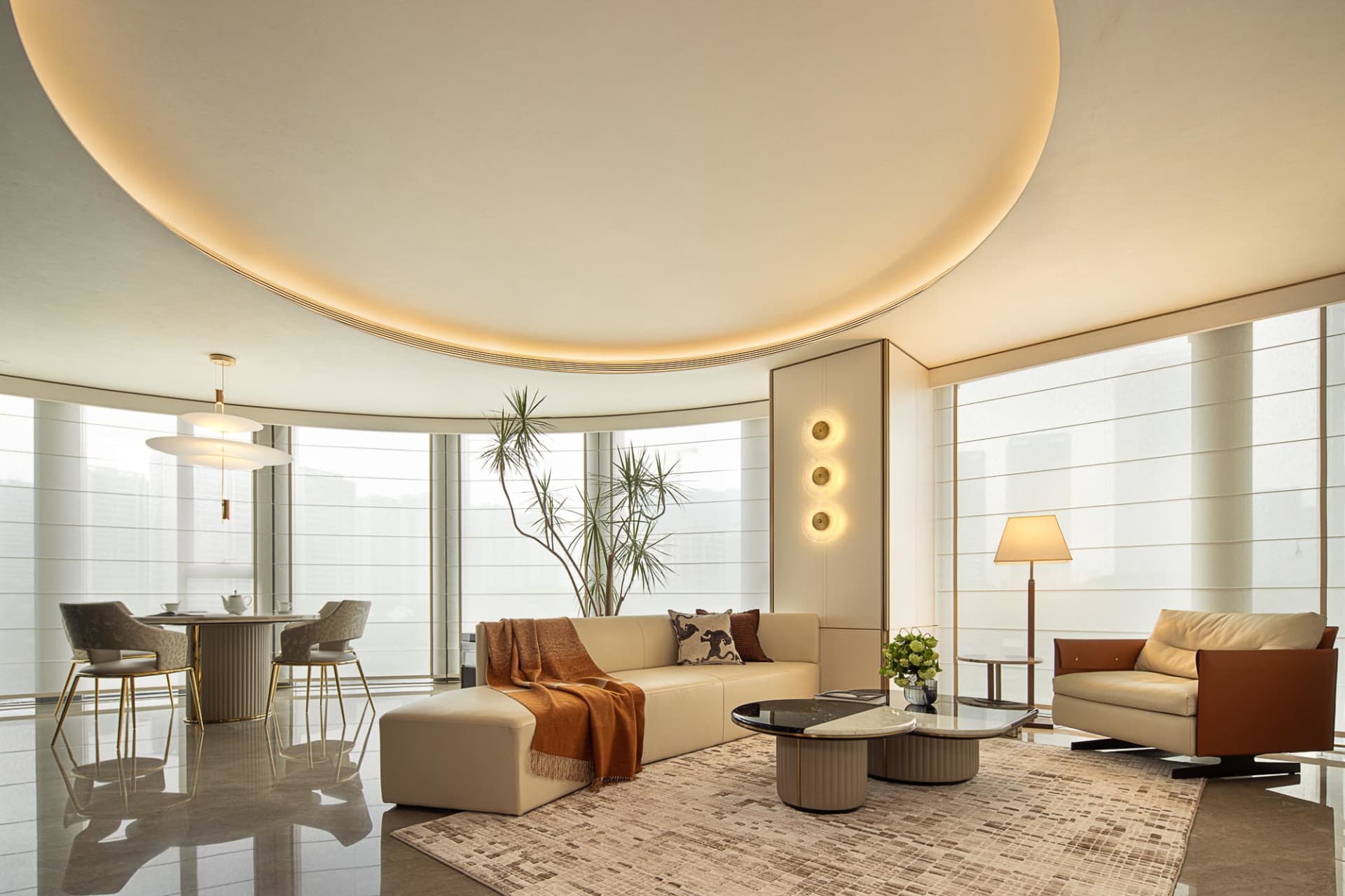 Luminous living room adorned with minimalist furnishings, featuring terrazzo flooring, sleek furniture, and contemporary ligh