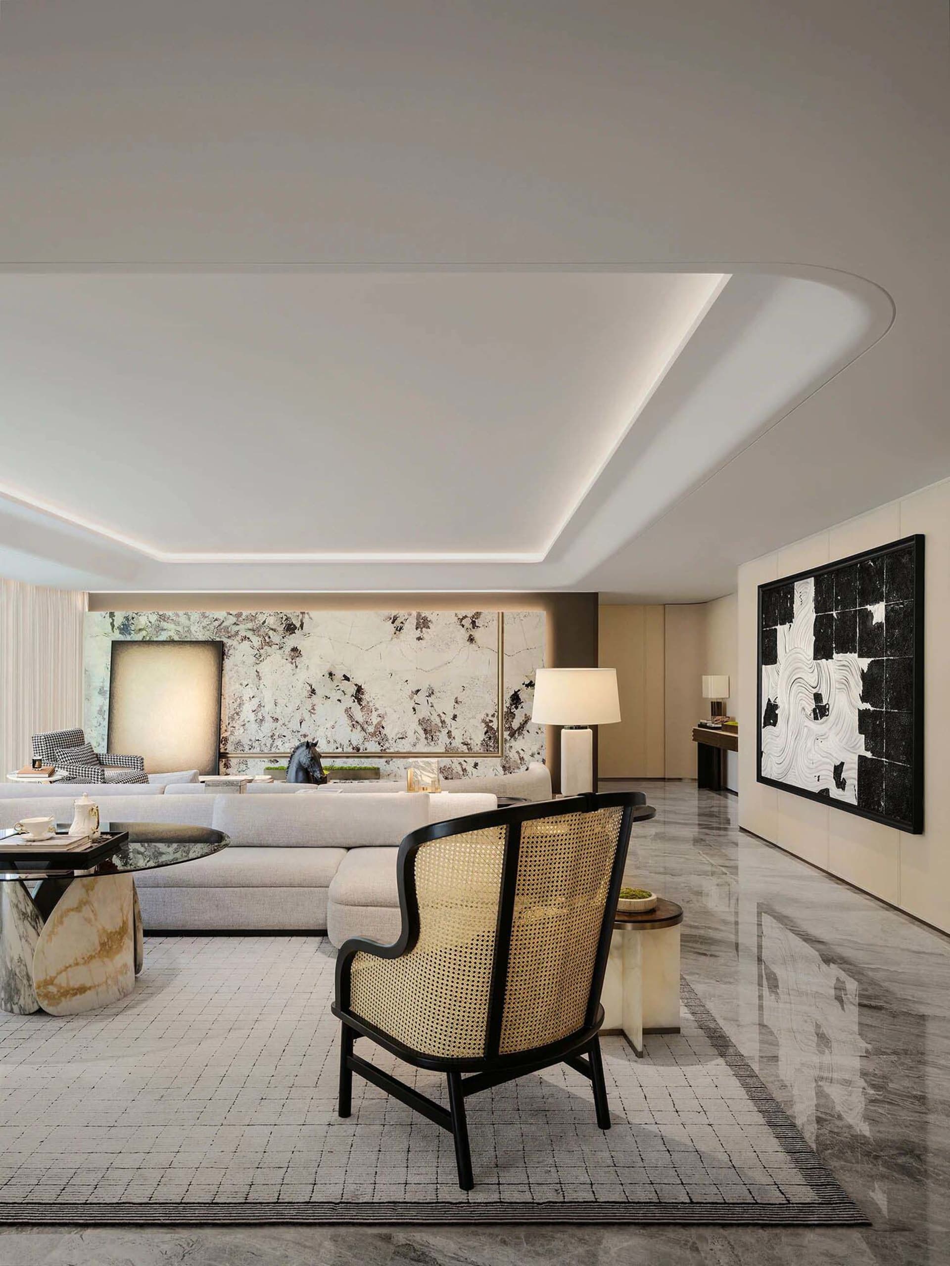 Modern living room furnished with blonde wooden chairs, coffee table, and curtains, adorned with a black and white abstract p