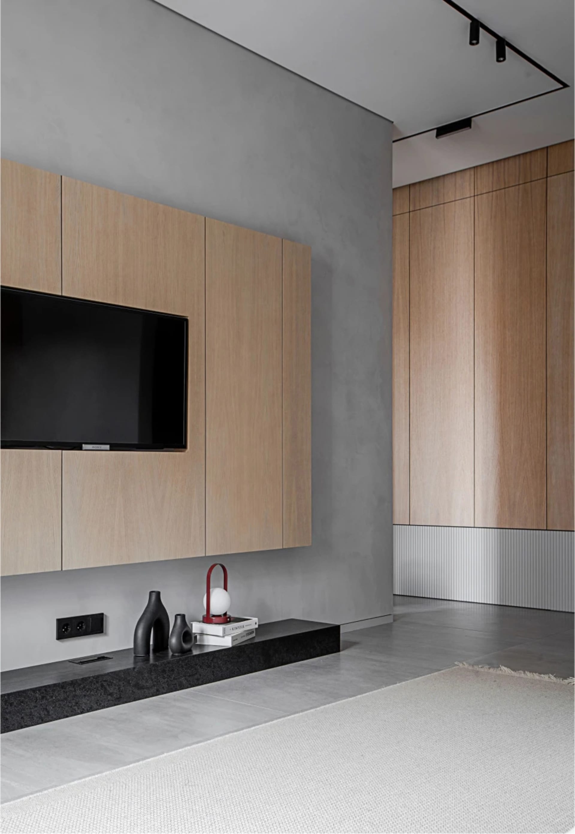 Modern interior design featuring wood and concrete materials