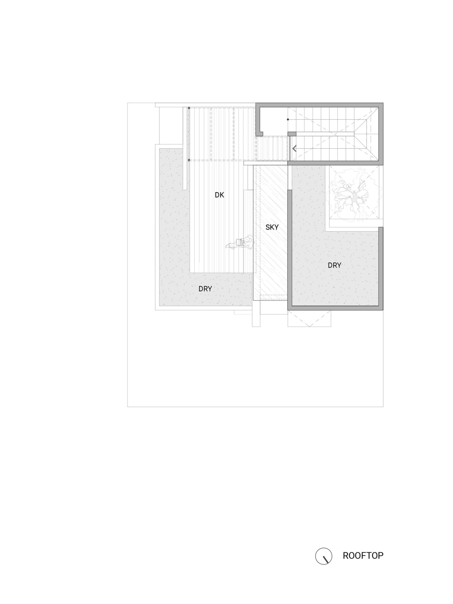 Floor plan of a rooftop space featuring a wooden deck and glass barriers.
