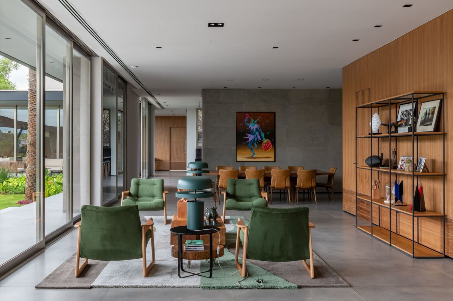 Contemporary living room with a concrete floor and minimalist design.