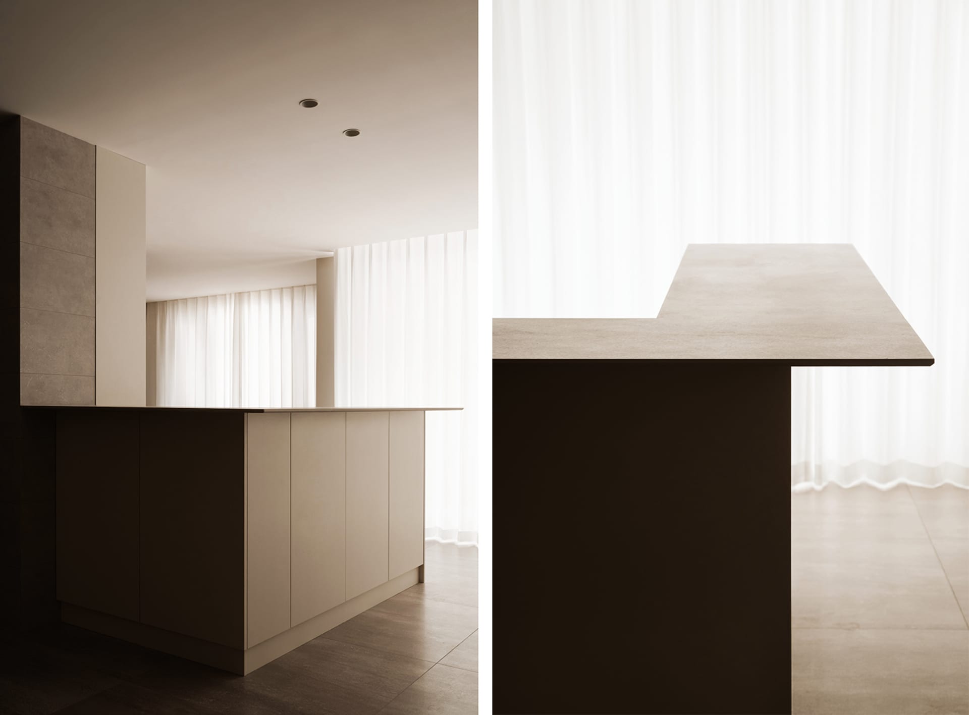 A modern kitchen with concrete countertops and minimalist design.