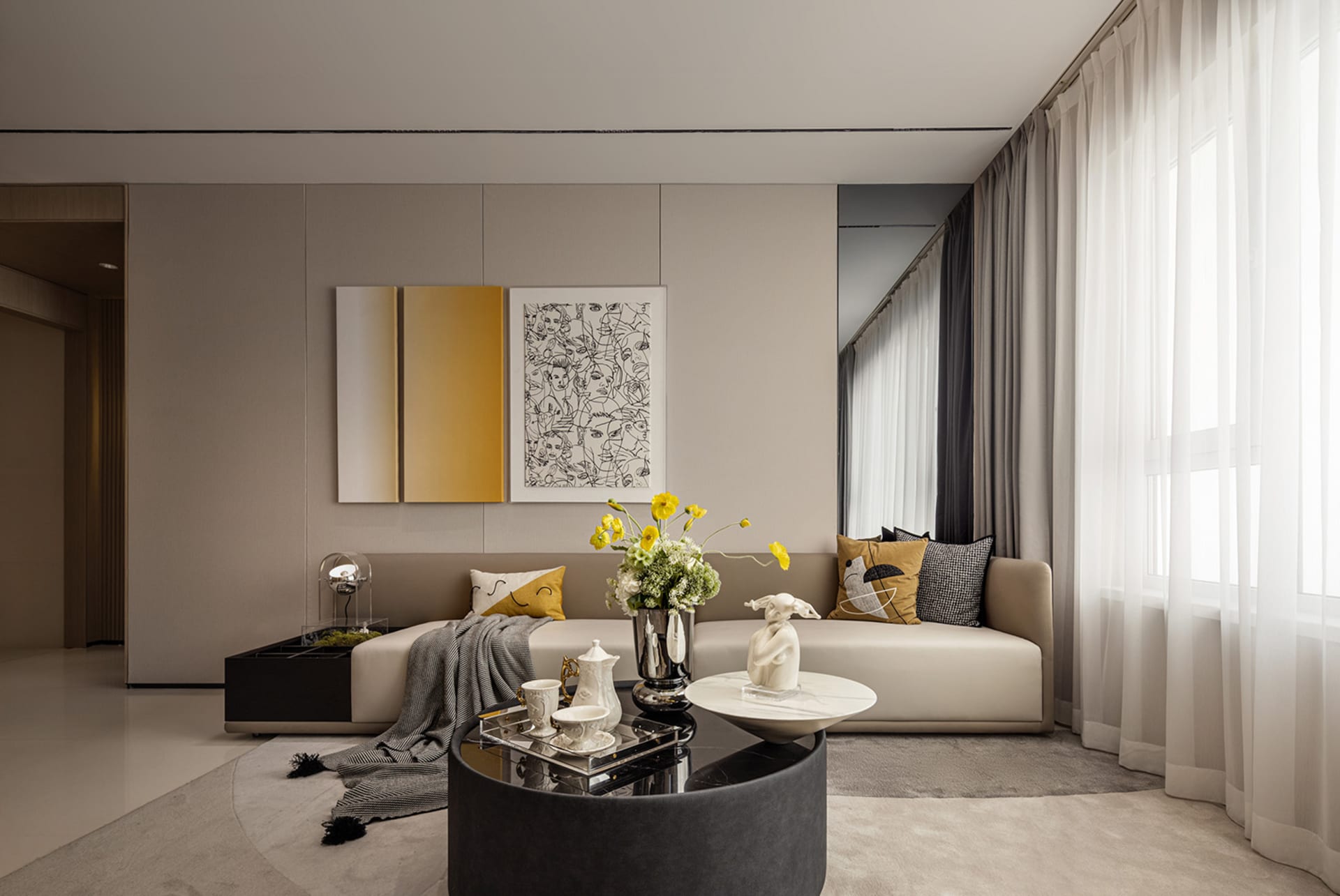 Modern living room interior with a neutral color scheme featuring a comfortable sofa, coffee table, and decorative elements l