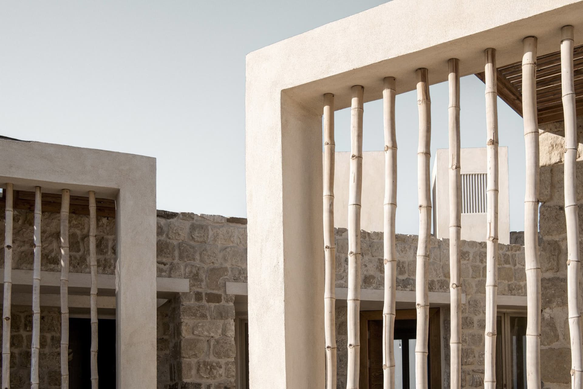Concrete columns and walls of a contemporary architectural structure.