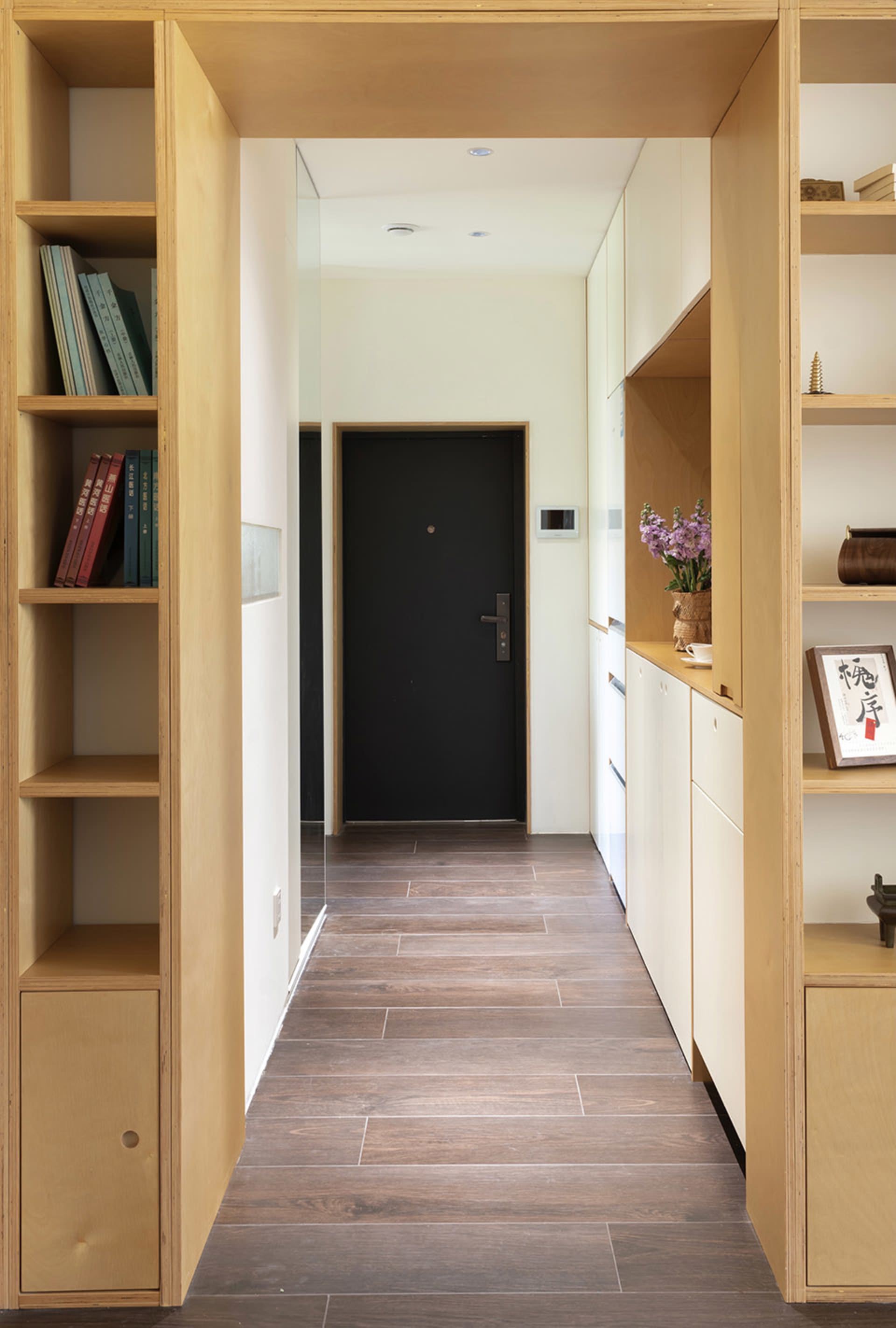 Modern home interior featuring wooden flooring and minimalistic design elements.
