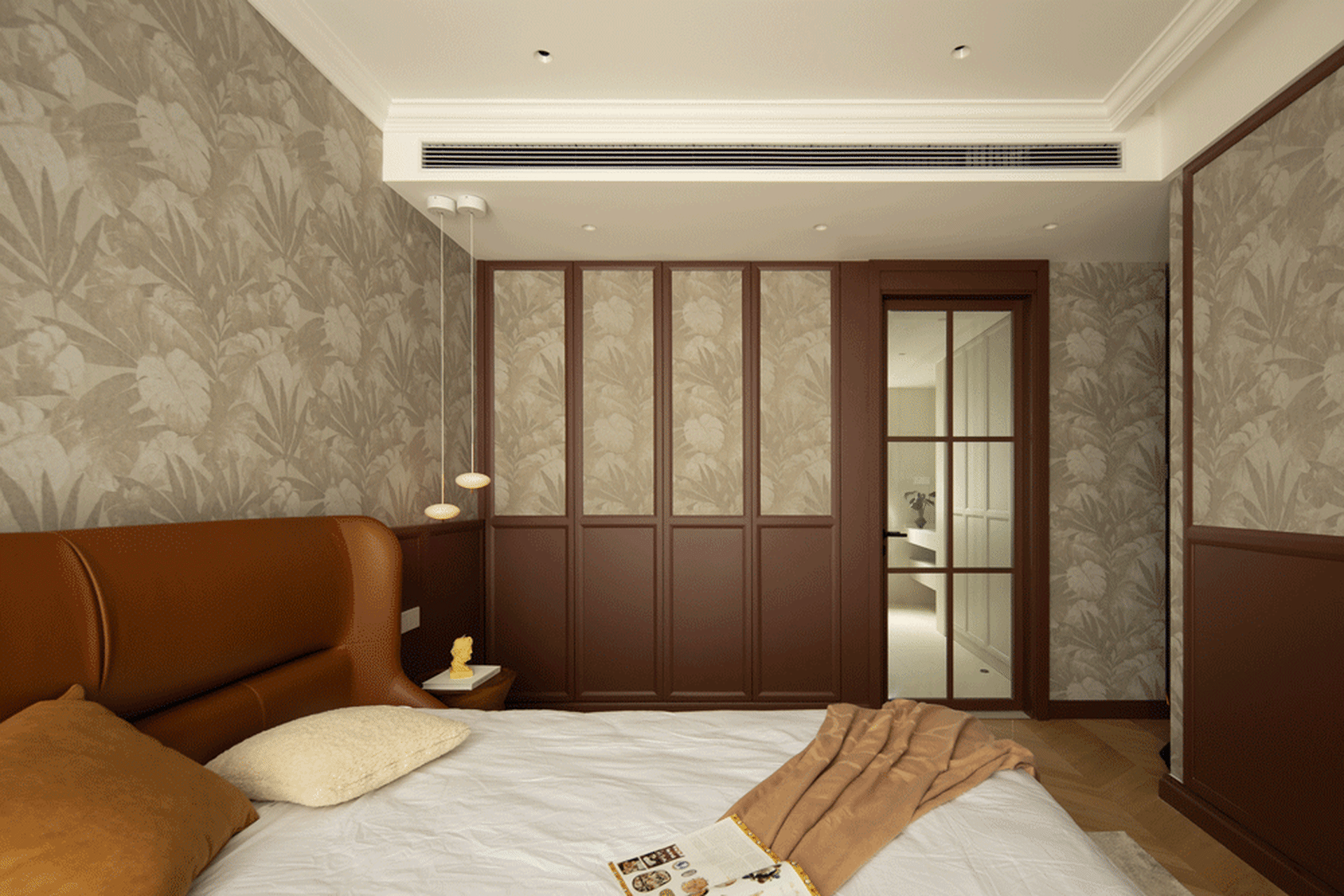 Bedroom with modern design featuring wood, leather, and fabric materials.
