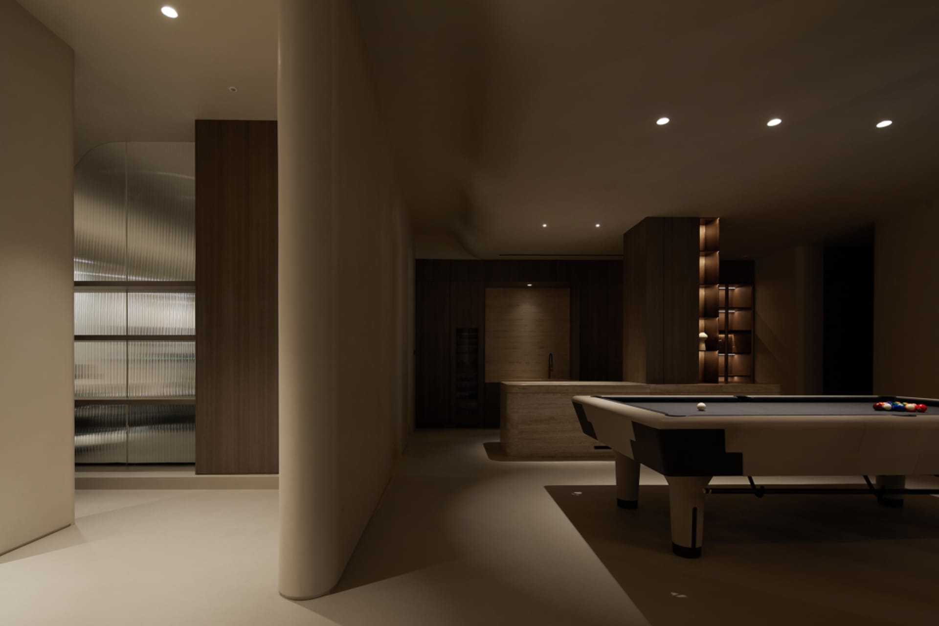 A modern residential entertainment space featuring a contemporary design with wooden elements.