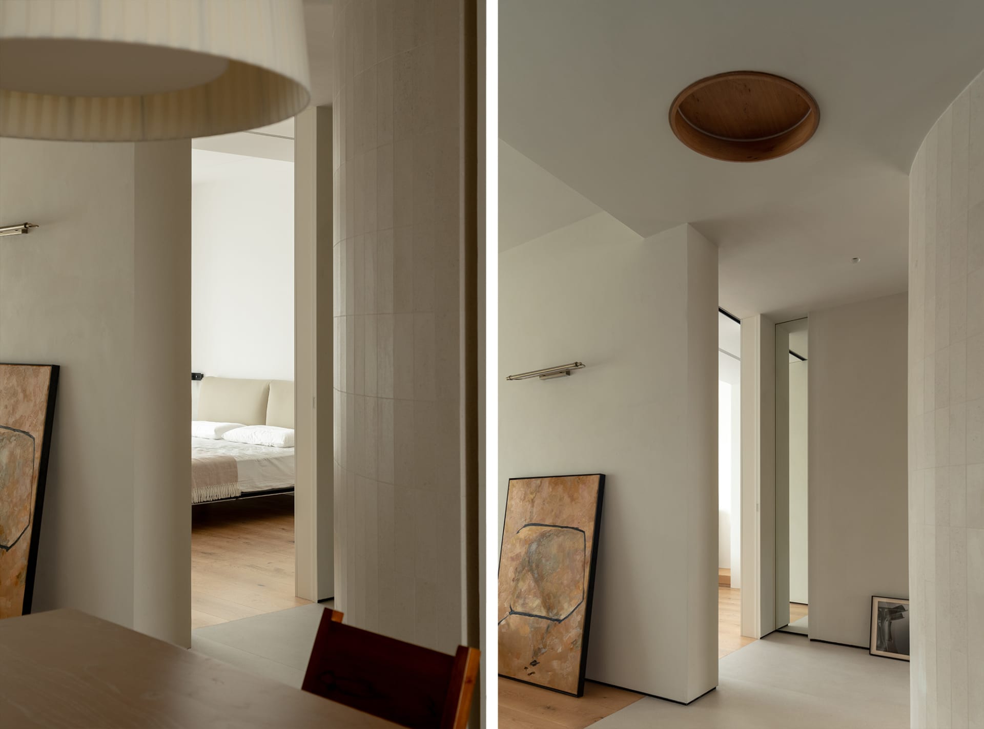 Modern interior design featuring minimalist concrete columns and lighting fixtures.