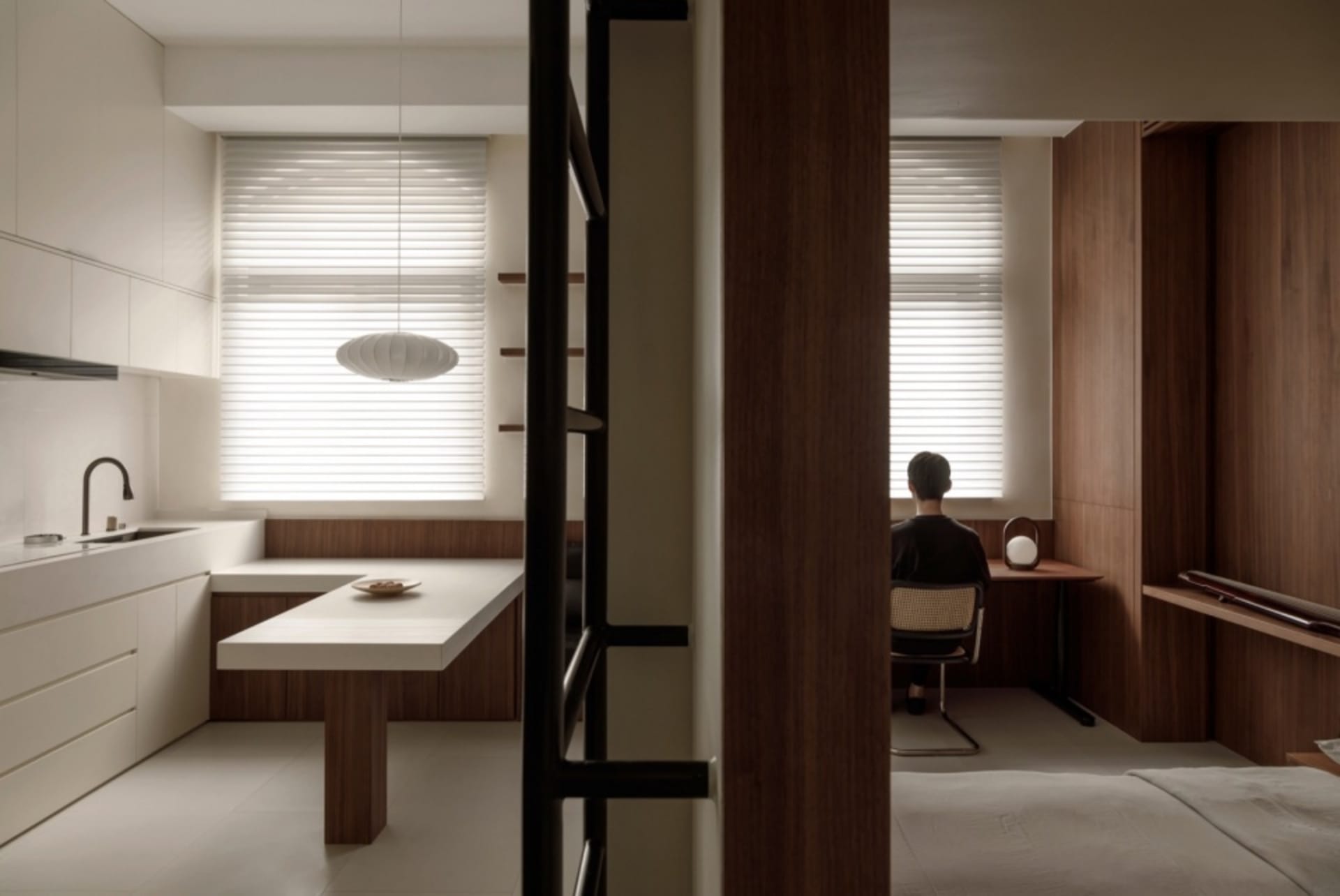 Modern kitchen featuring minimalist design, white cabinets, and wooden accents.