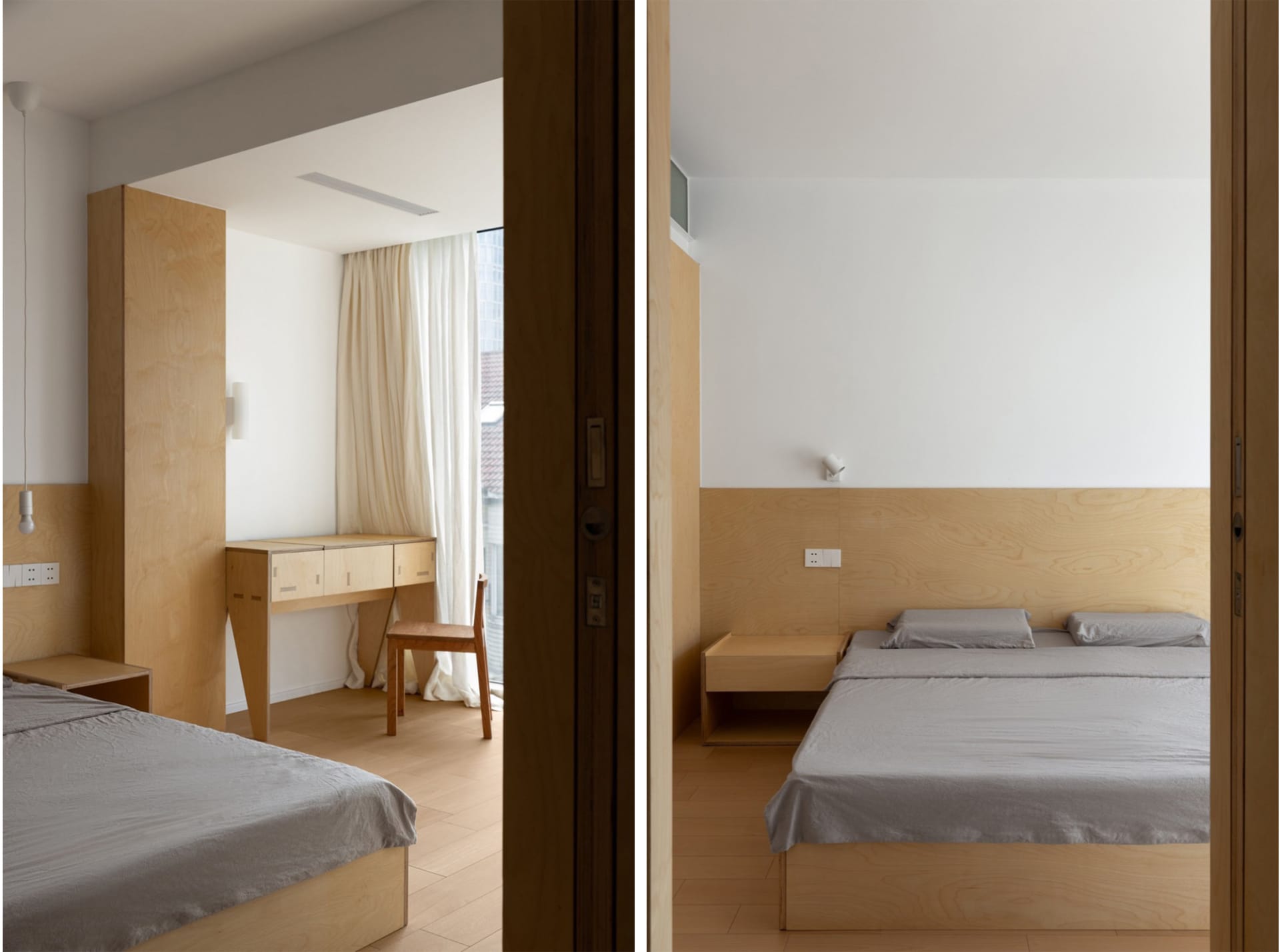 A minimalist bedroom with wooden furniture and a white bedspread.