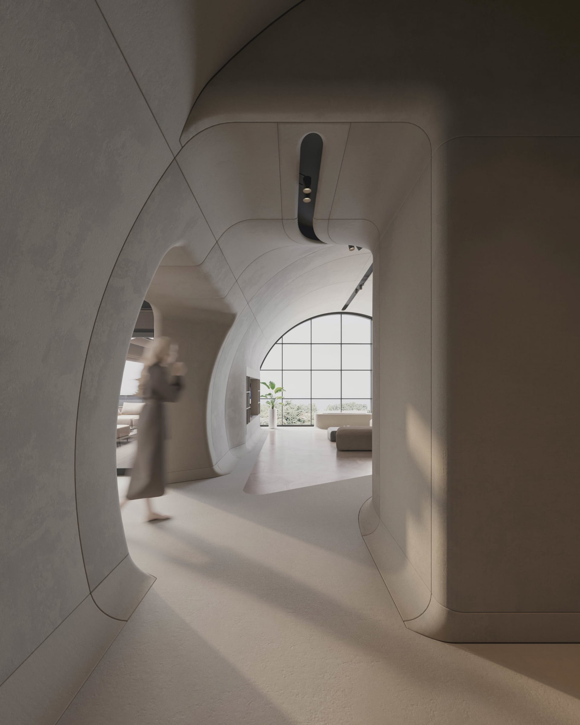A modern, patterned concrete corridor with curved walls and a large arched window.