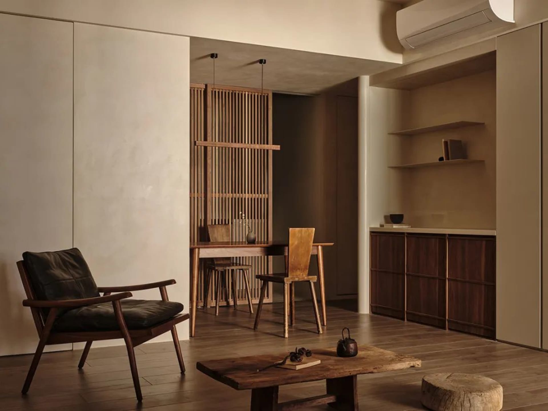 Contemporary living room featuring wooden furniture and a minimalist design.