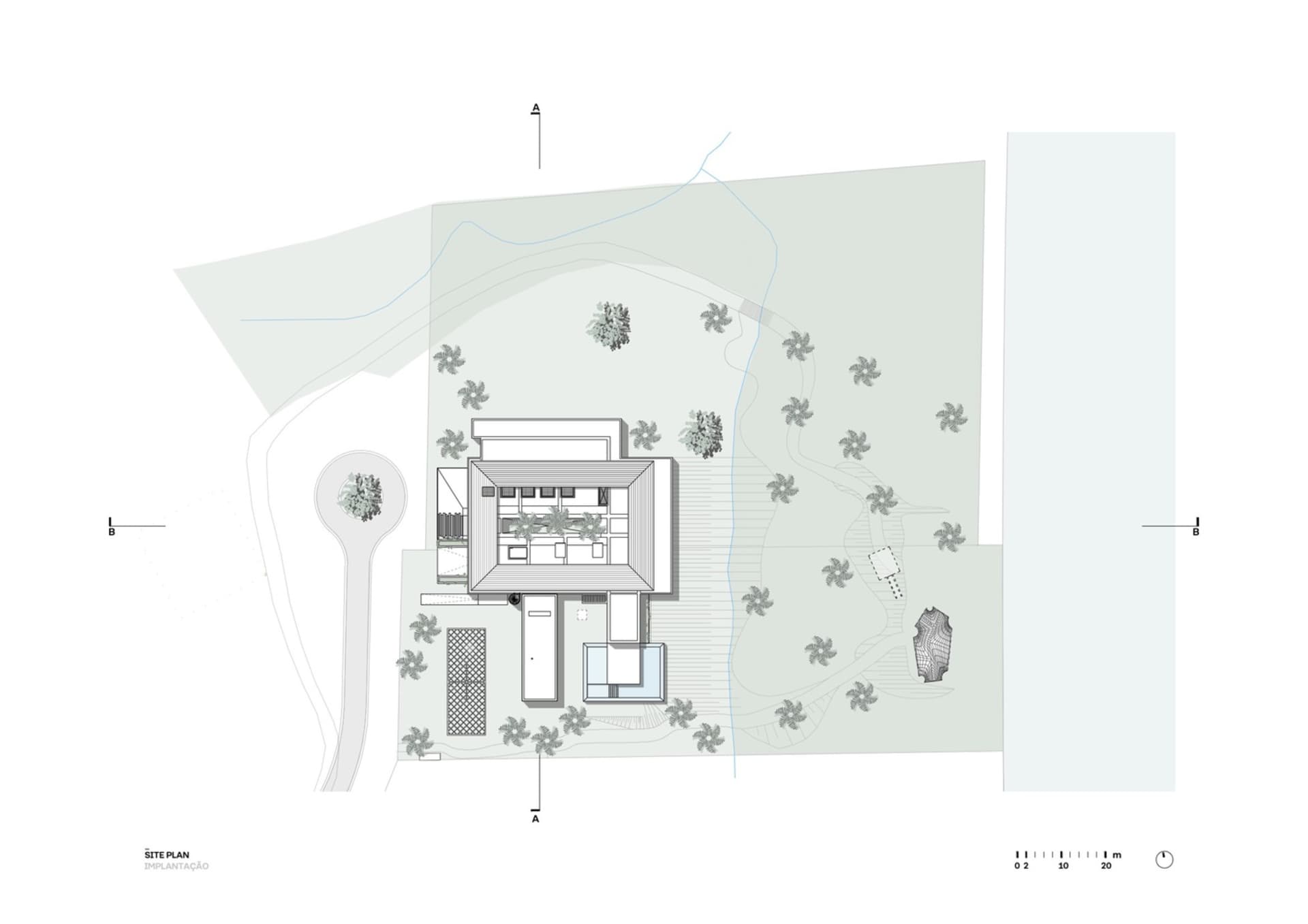 一張現代基地配置圖，包含建築物、樹木與步道