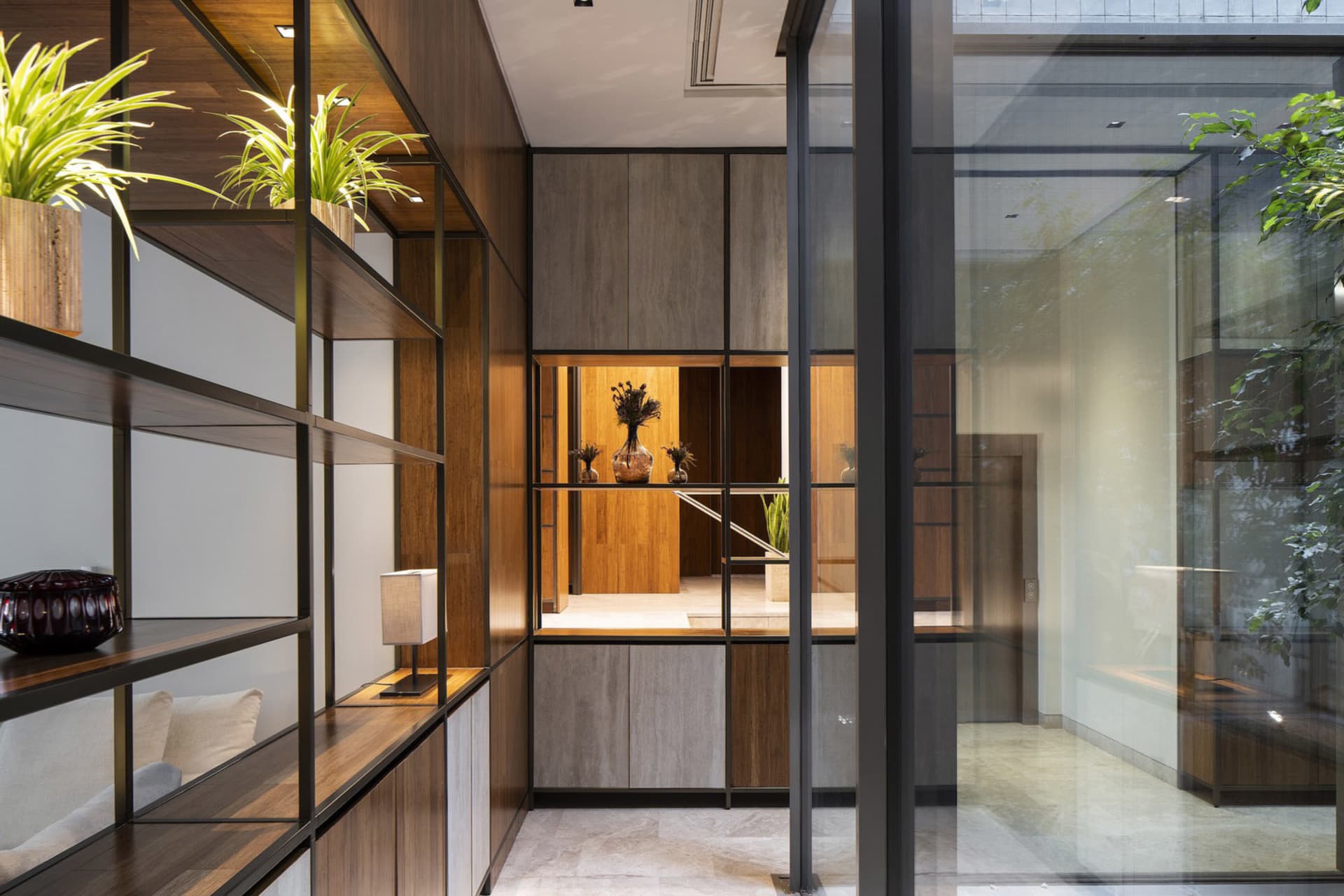 Modern living room with wooden accents and green plants