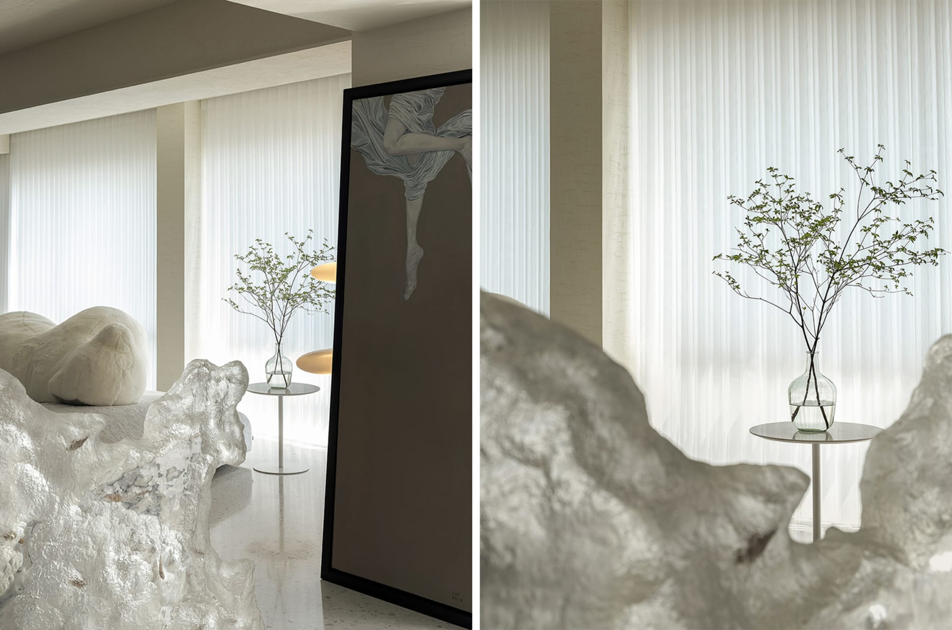 Modern living room with glass walls and minimalistic decor.