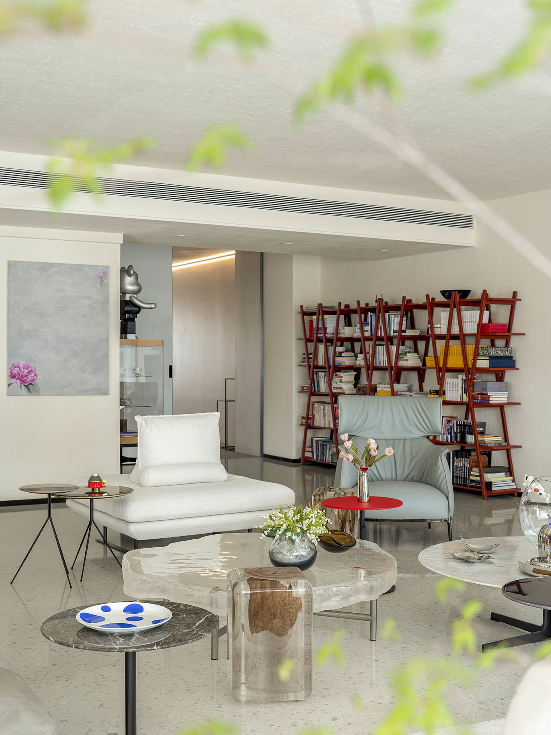 A modern living room featuring contemporary furniture and decor.