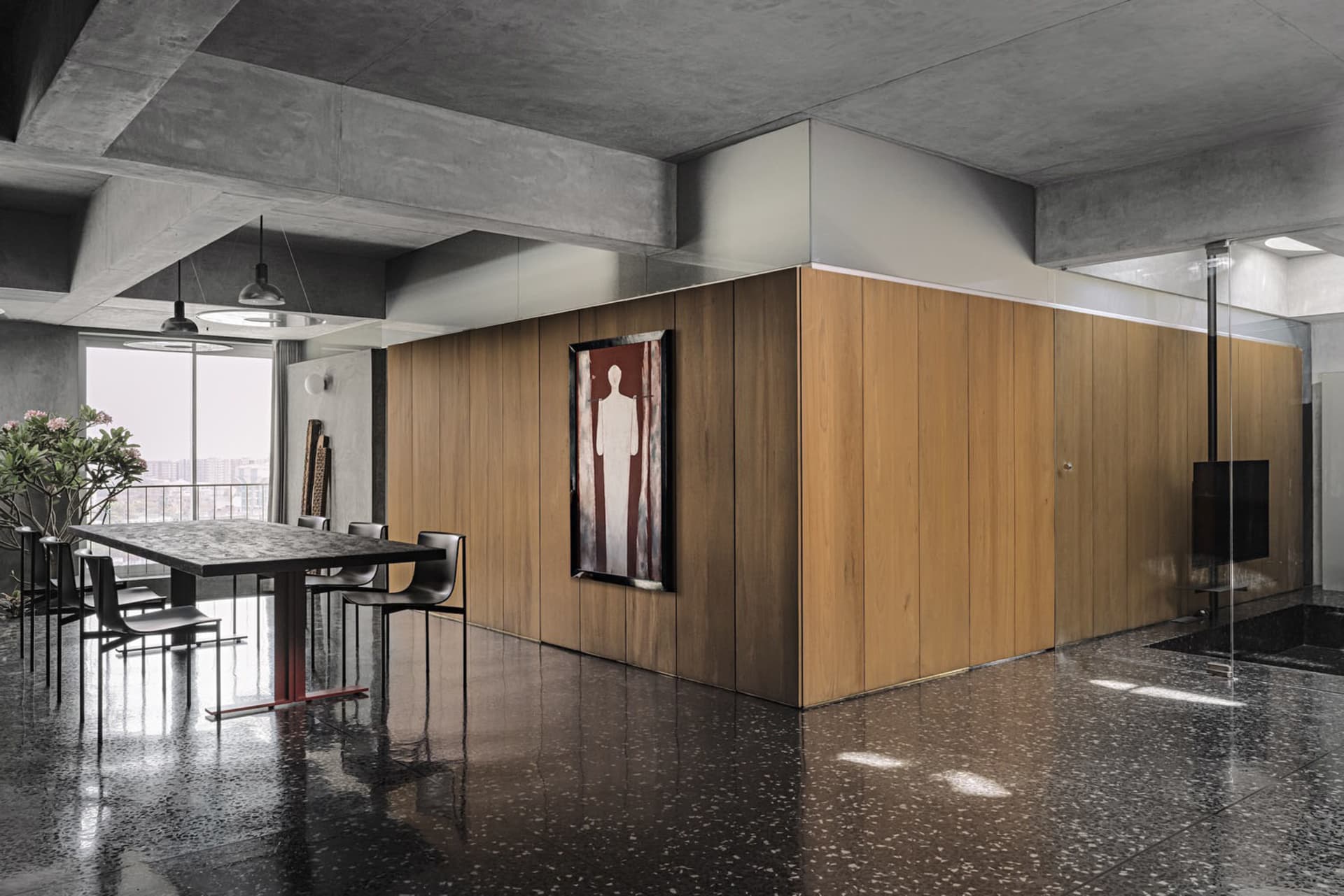 A minimalist interior design featuring wood elements in a modern setting.