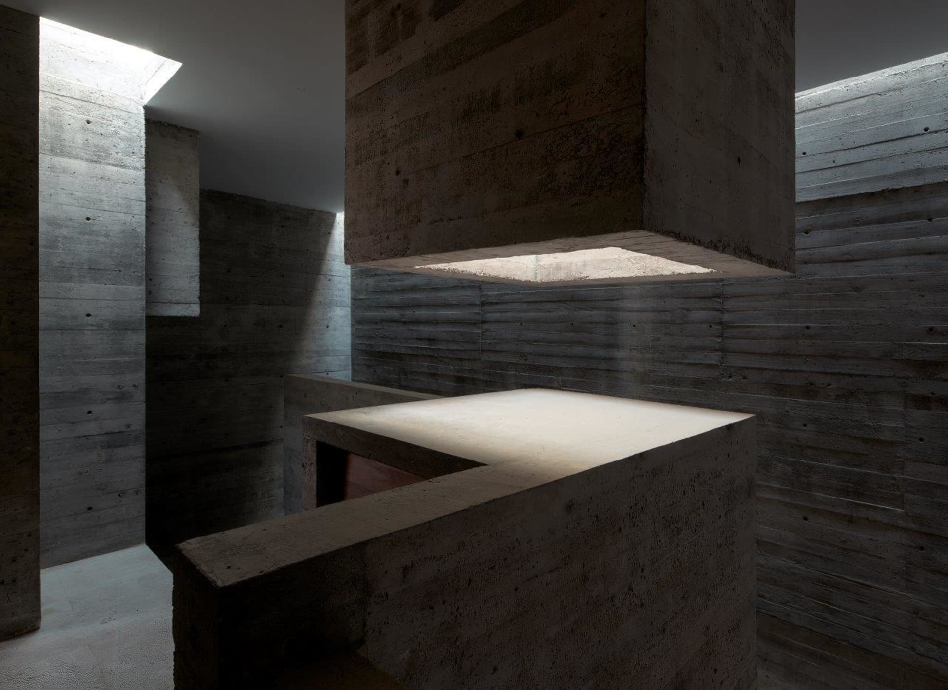 Modern minimalist architecture featuring industrial concrete elements