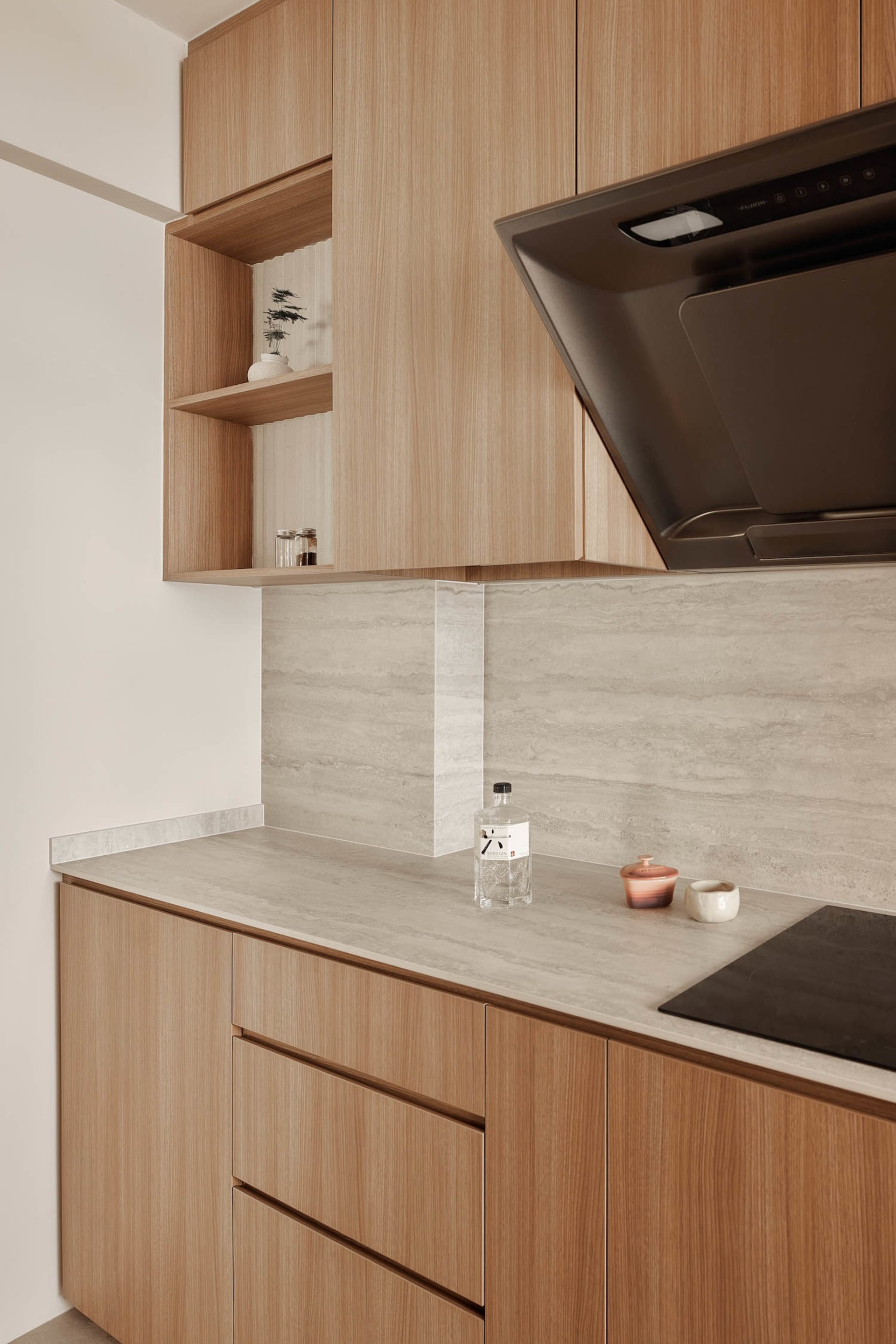 Modern kitchen with concrete countertops and cabinets