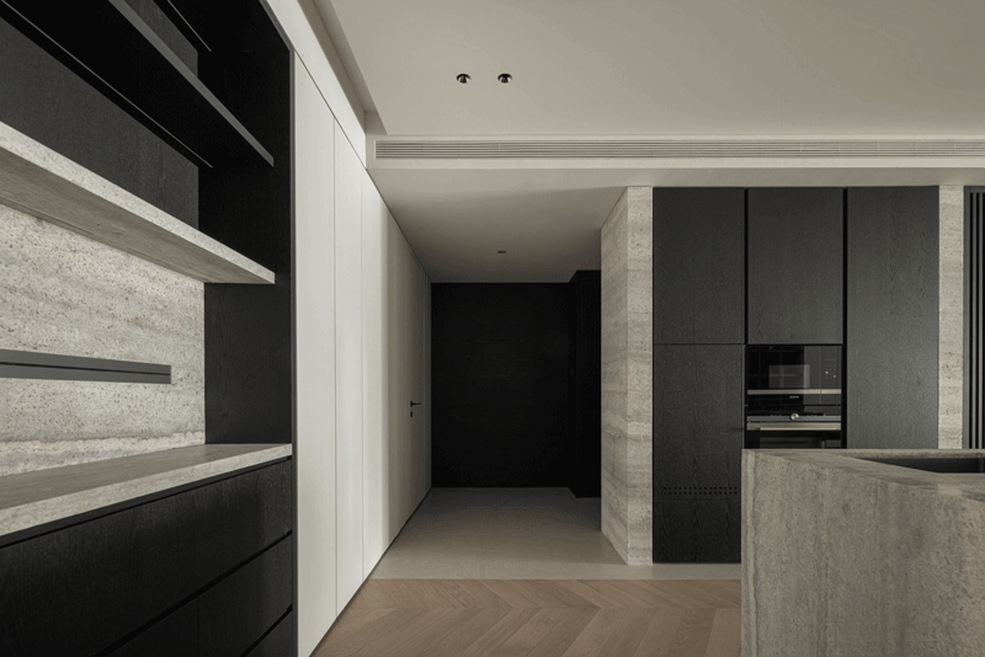 Modern residential interior with concrete, wood, and marble materials