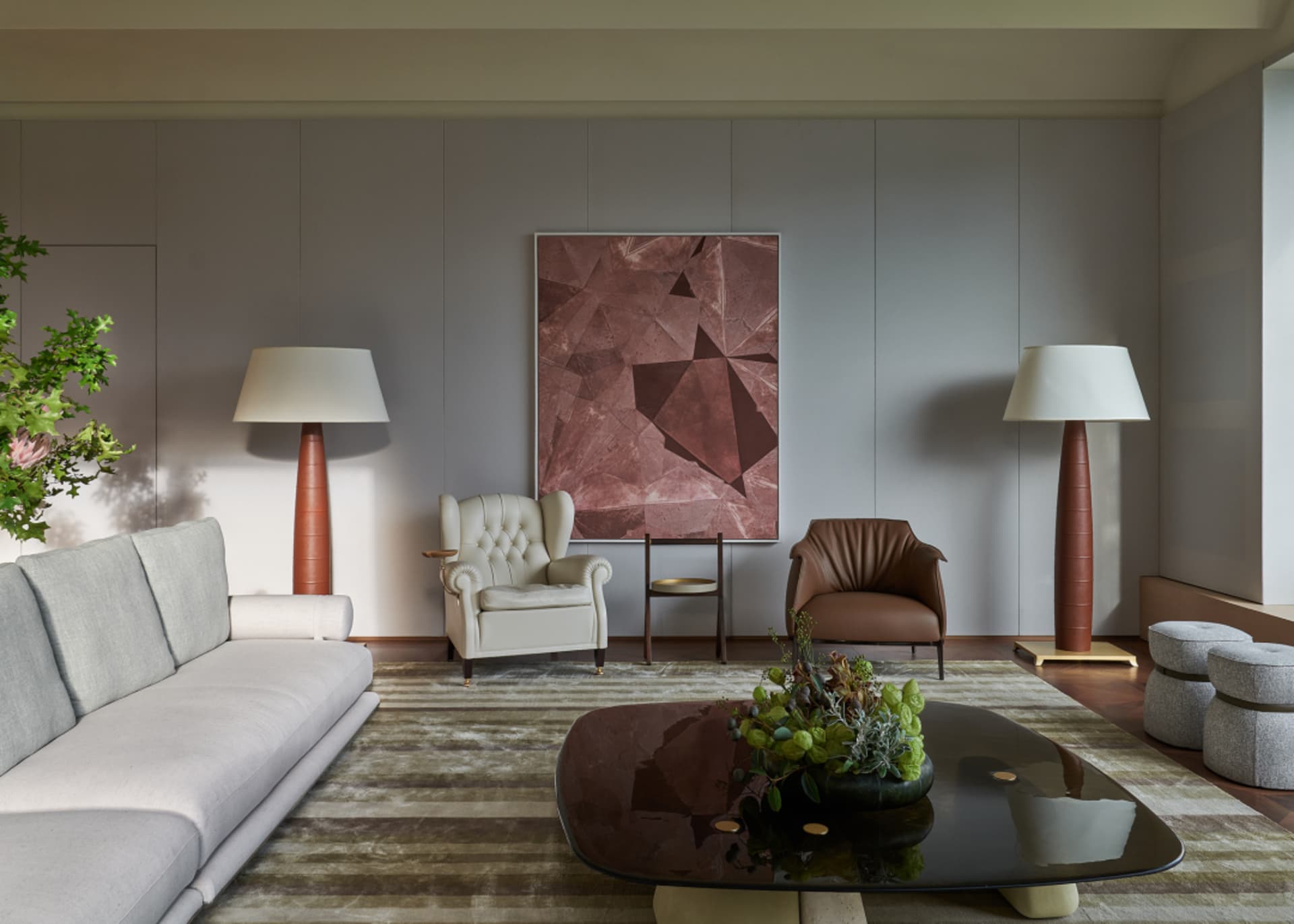 A sophisticated modern leather living room with minimalist decor.