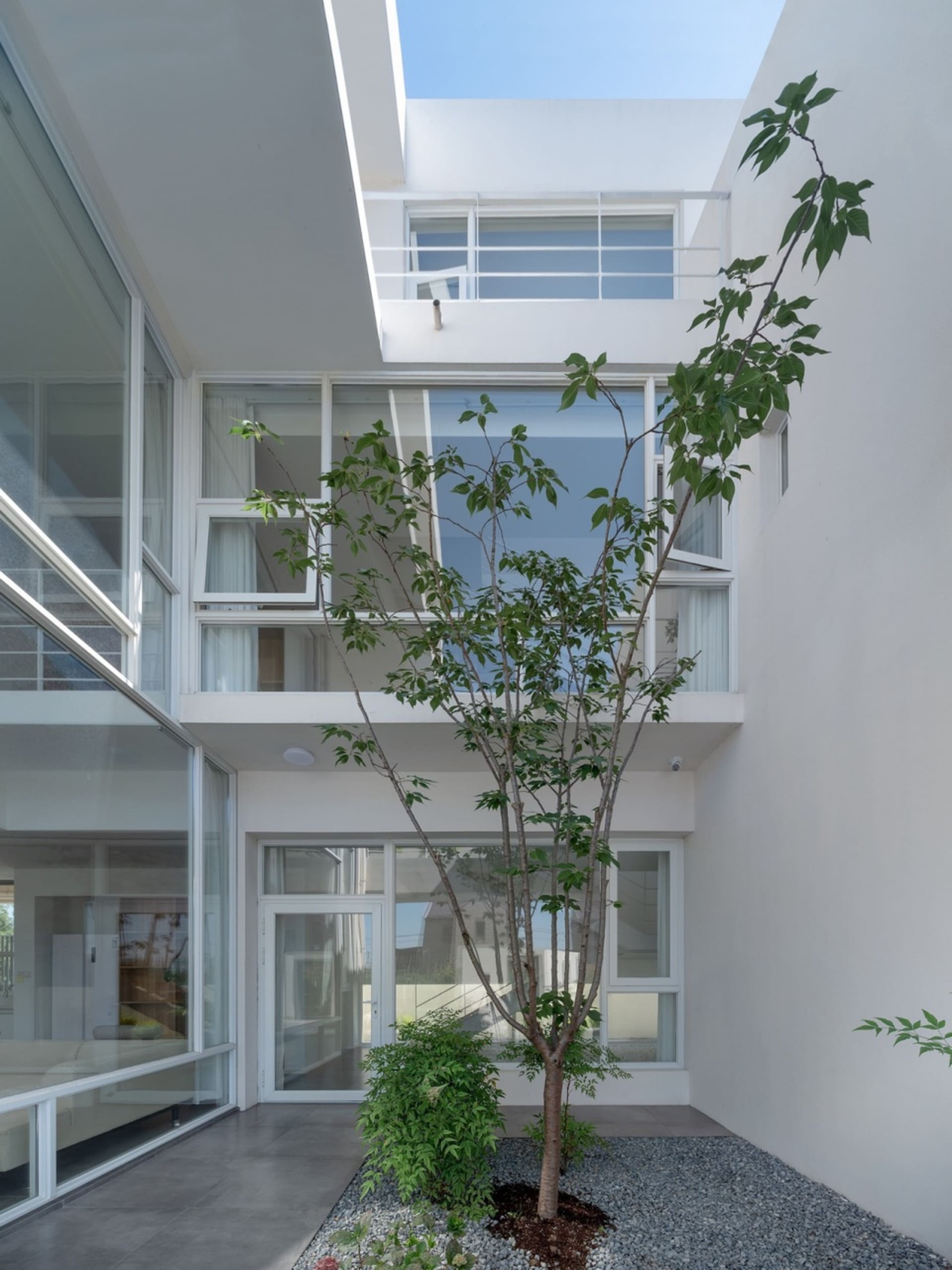 Modern house interior with glass walls and ceiling