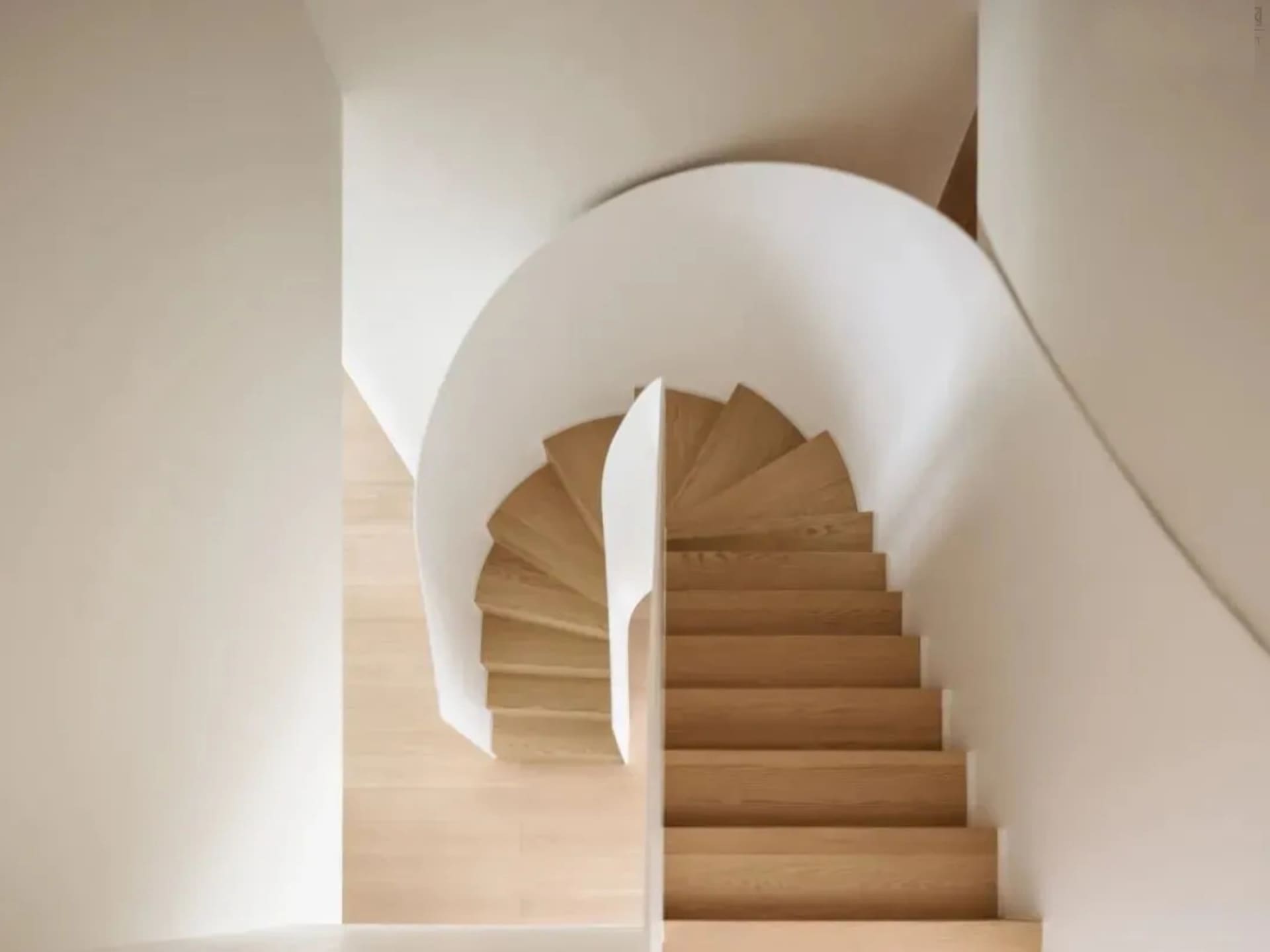 A minimalist staircase with wooden steps