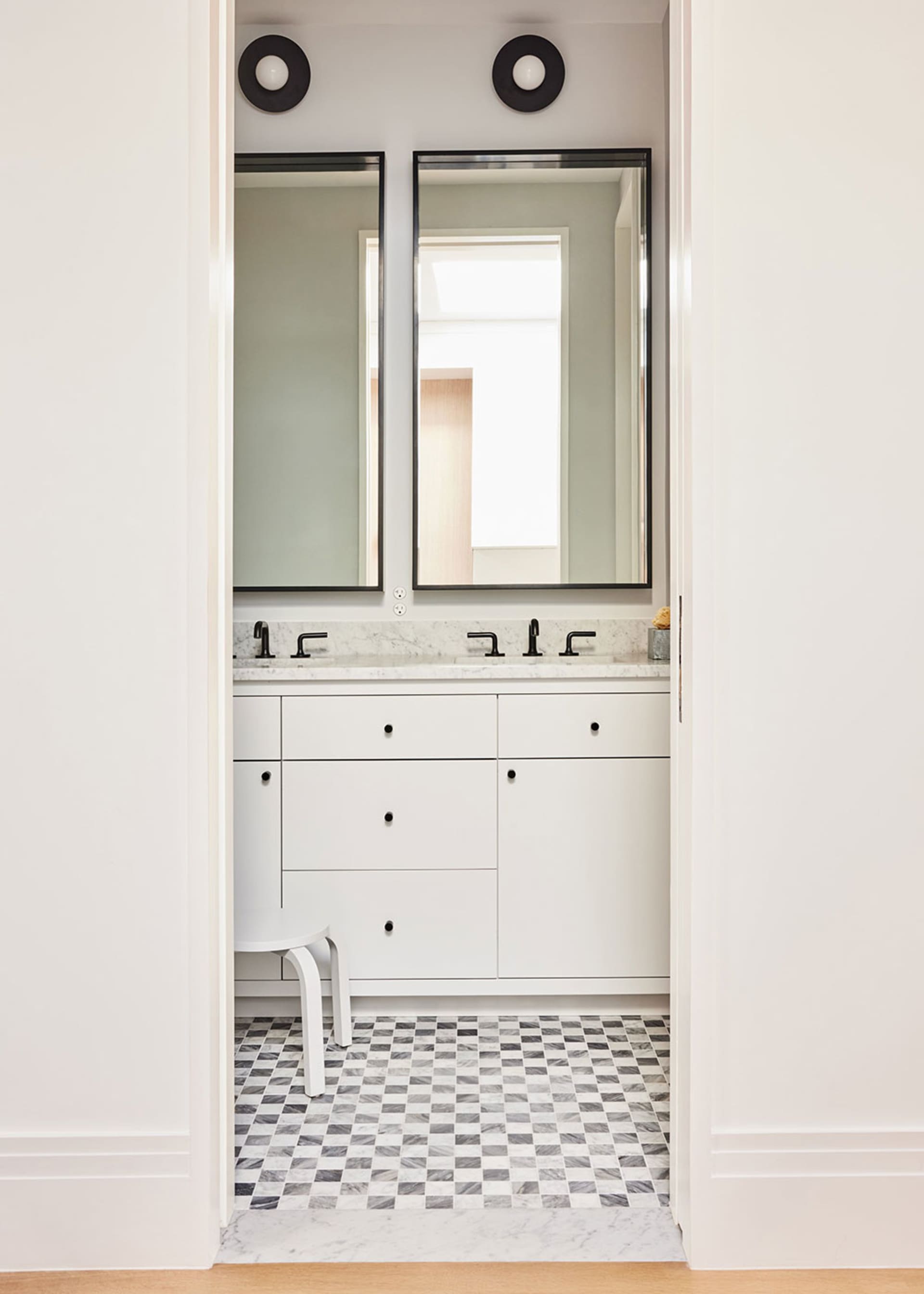 Modern bathroom with marble and glass elements