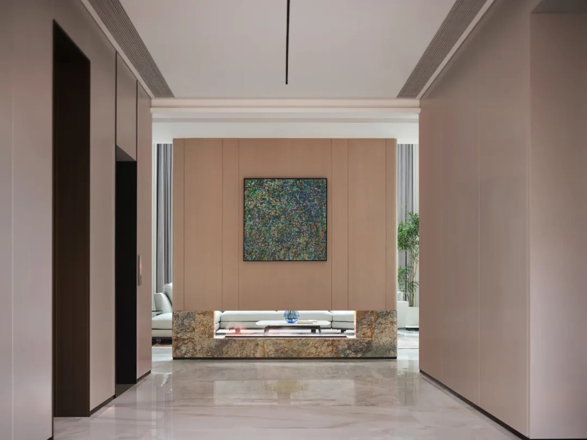 Modern living room featuring wooden paneling and marble flooring